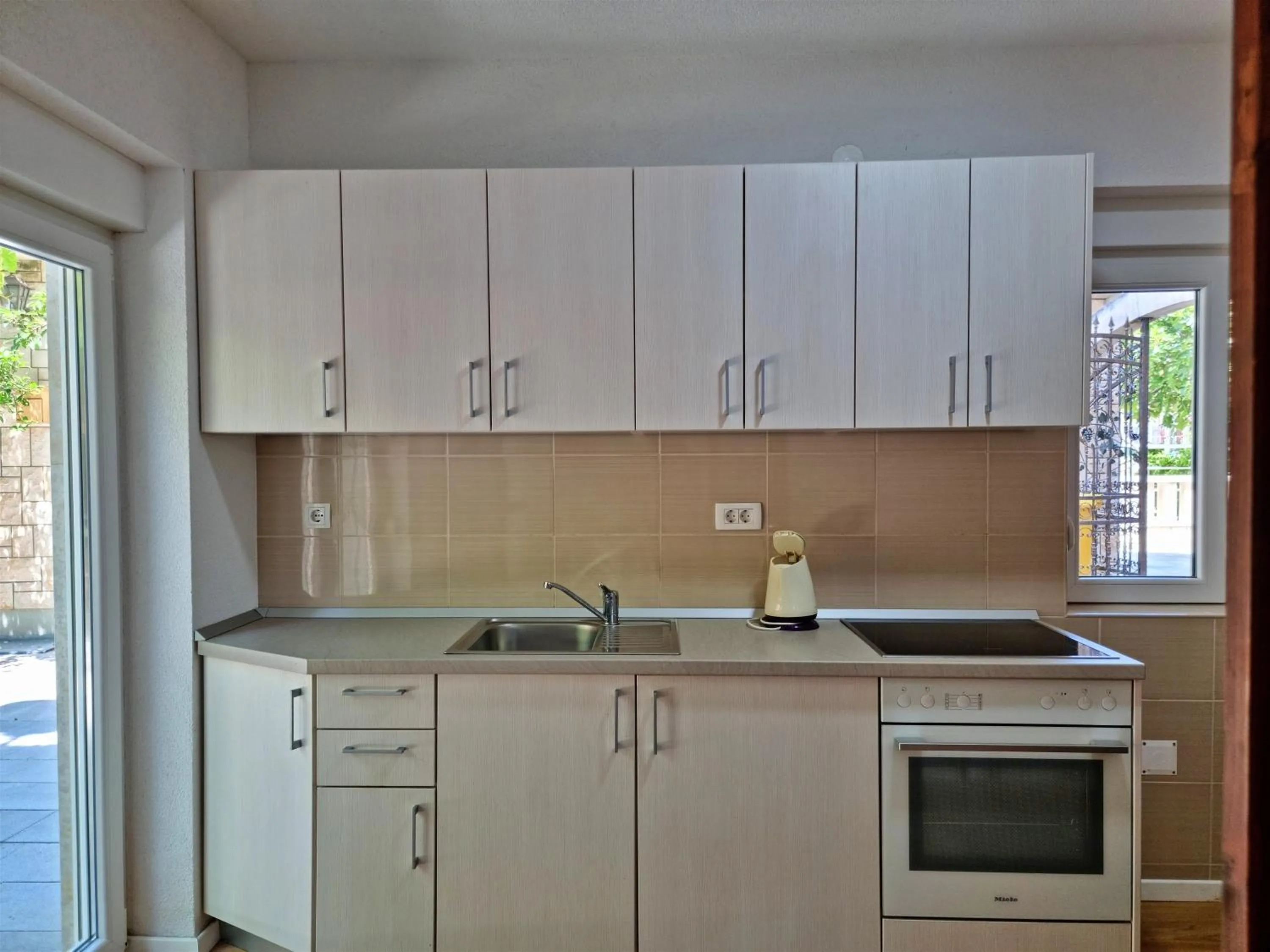 kitchen in Apartments Iko Nemira