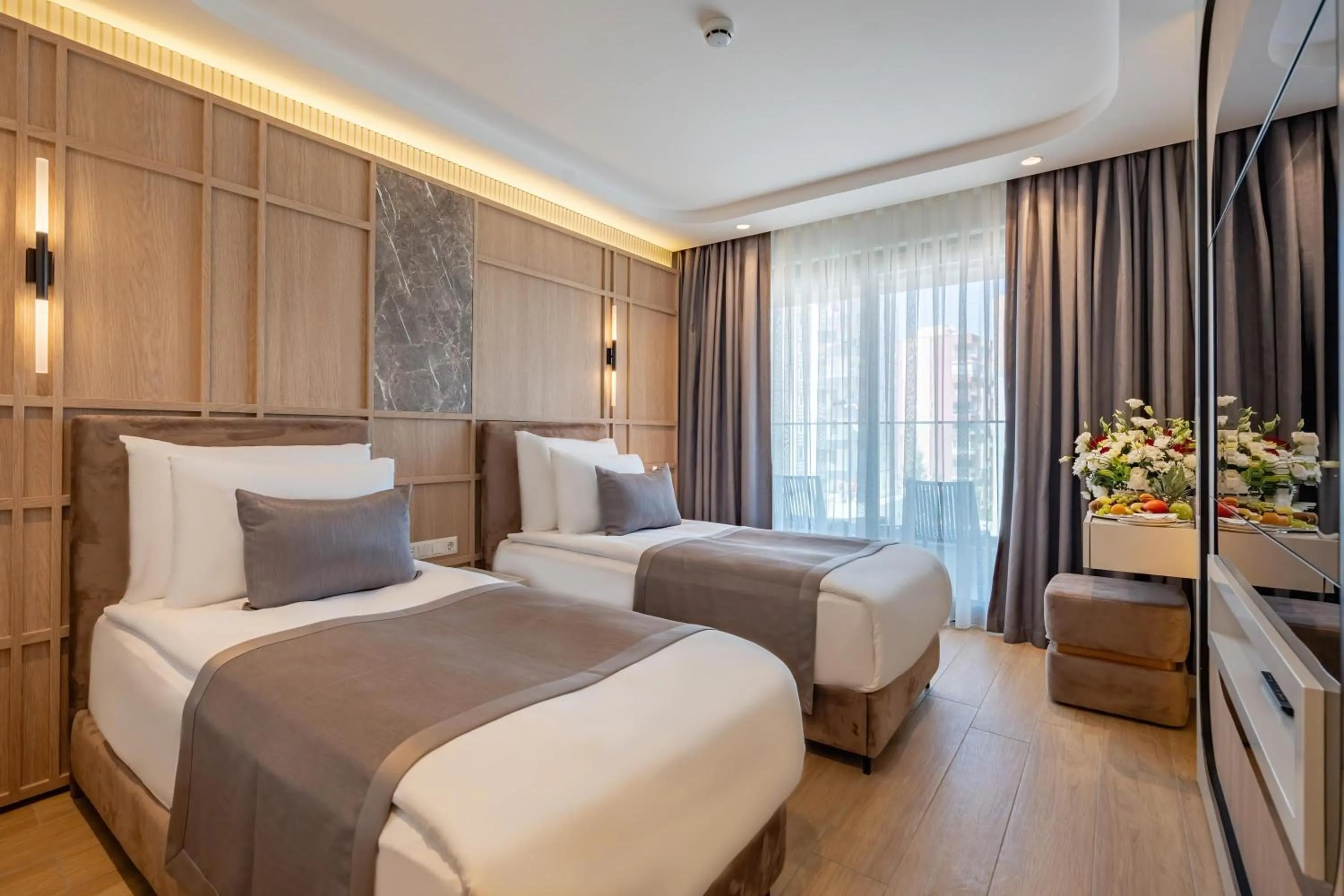 Bed in Awen Lara Hotel