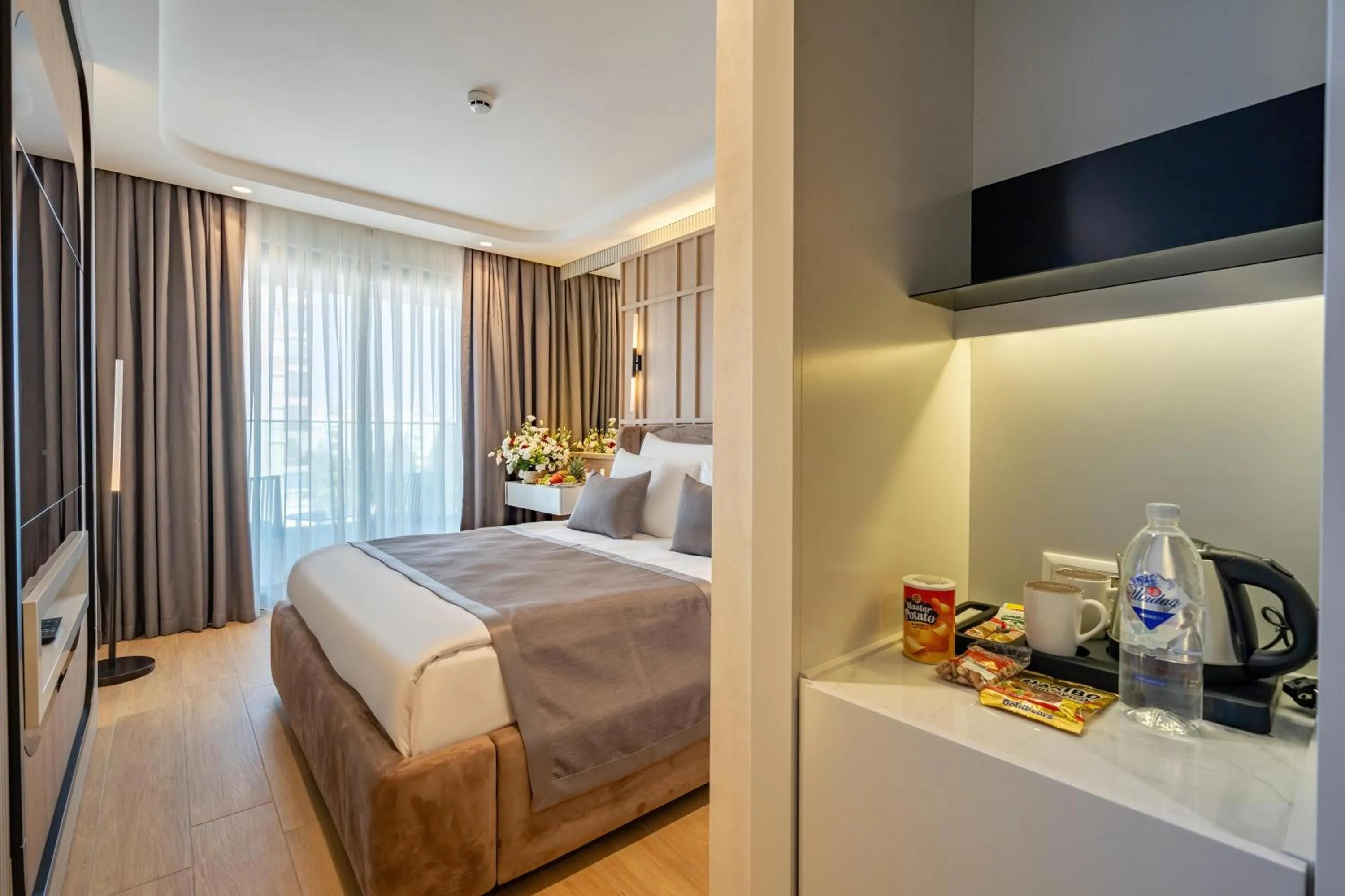 Bed in Awen Lara Hotel