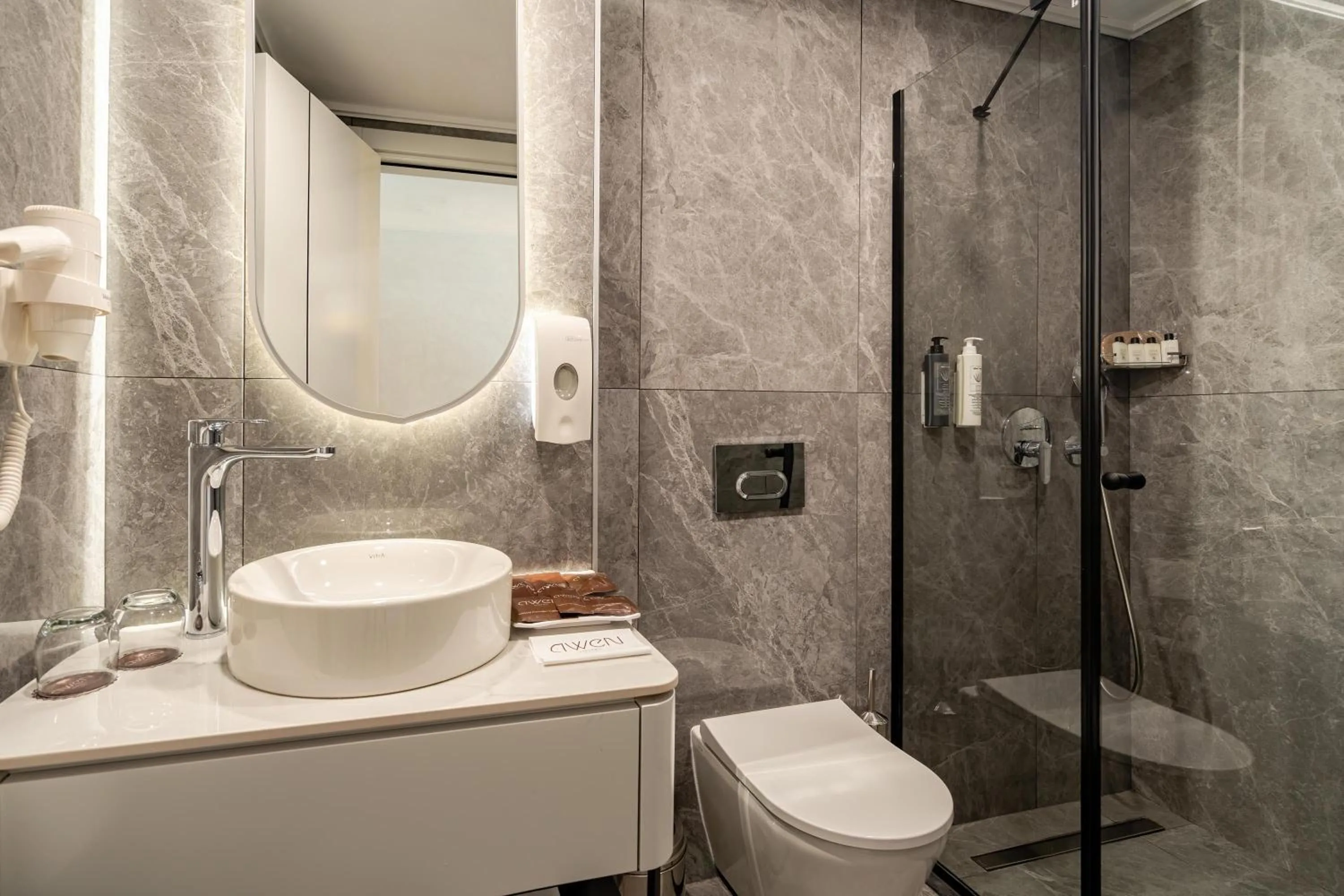 Shower in Awen Lara Hotel