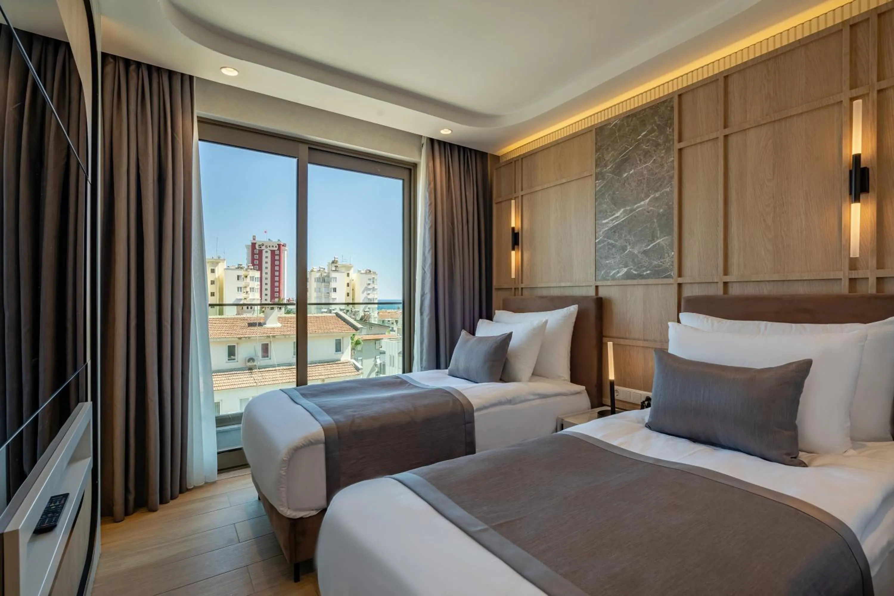 Bed in Awen Lara Hotel