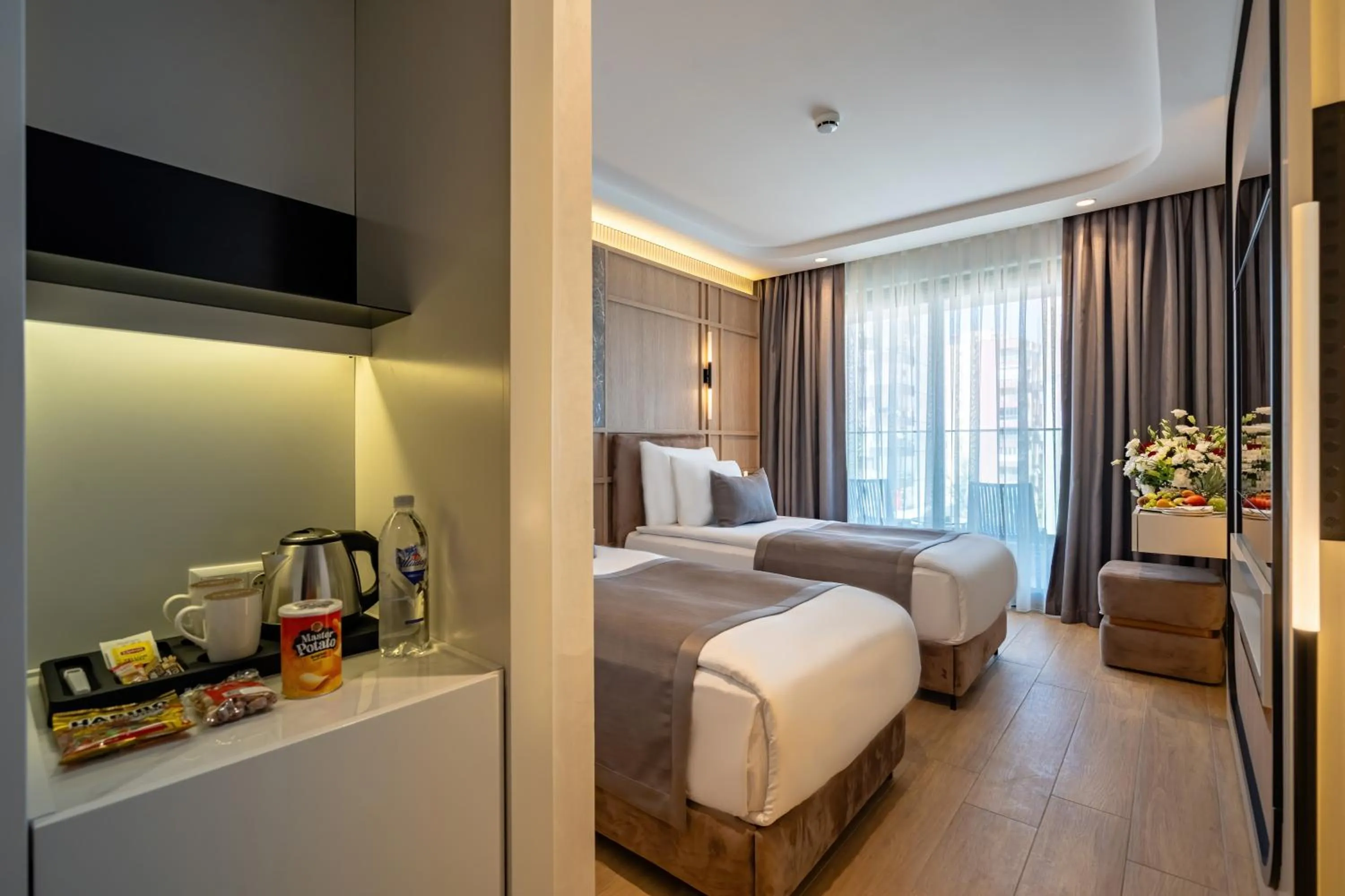 Bed in Awen Lara Hotel