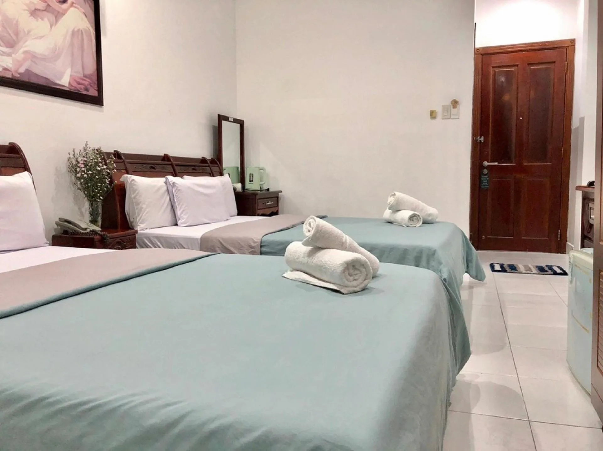 Bed in Saigon Cozy Hotel