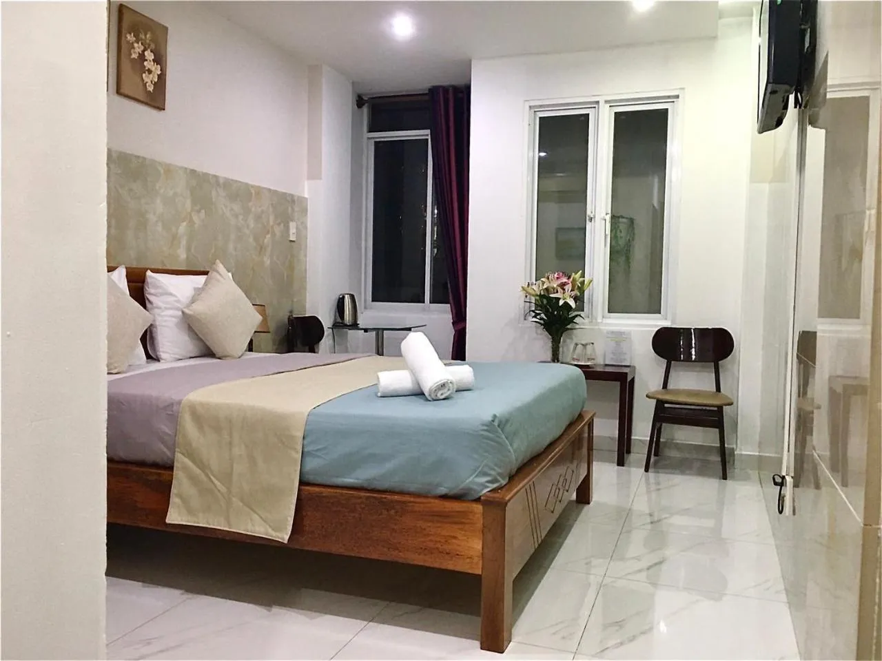 Bed in Saigon Cozy Hotel