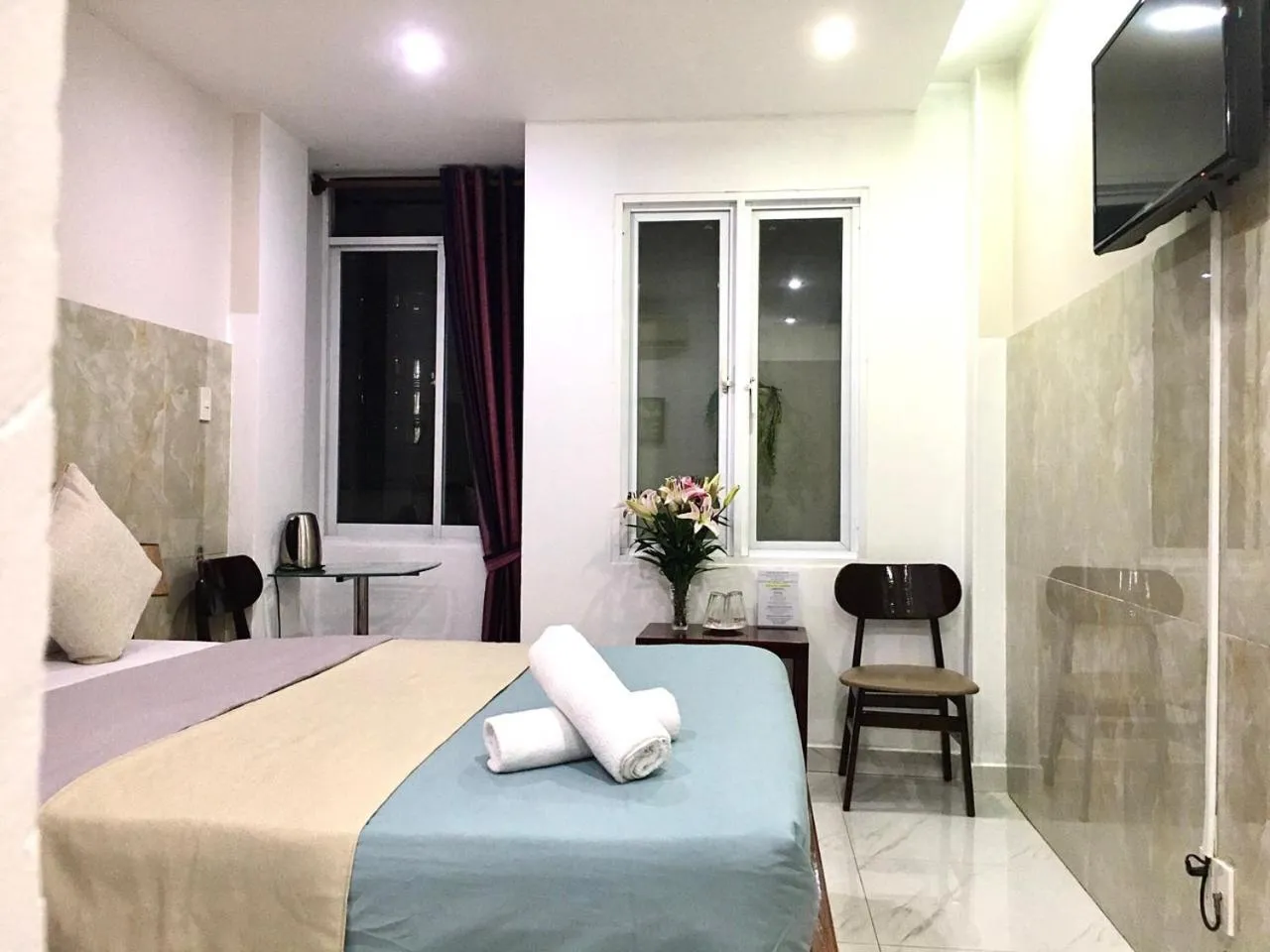 Bed in Saigon Cozy Hotel