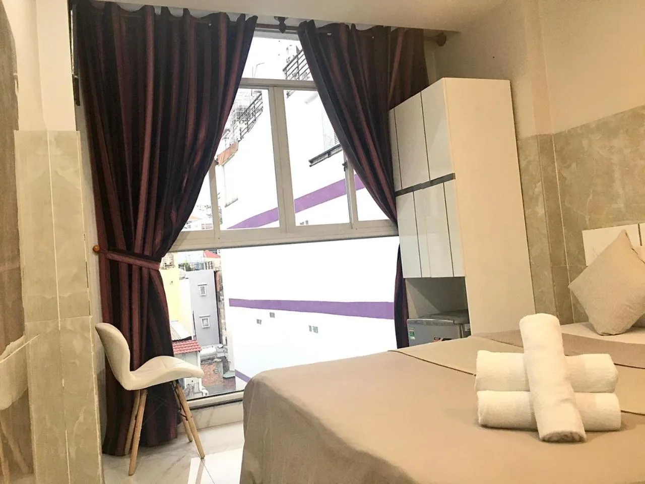 Bed in Saigon Cozy Hotel