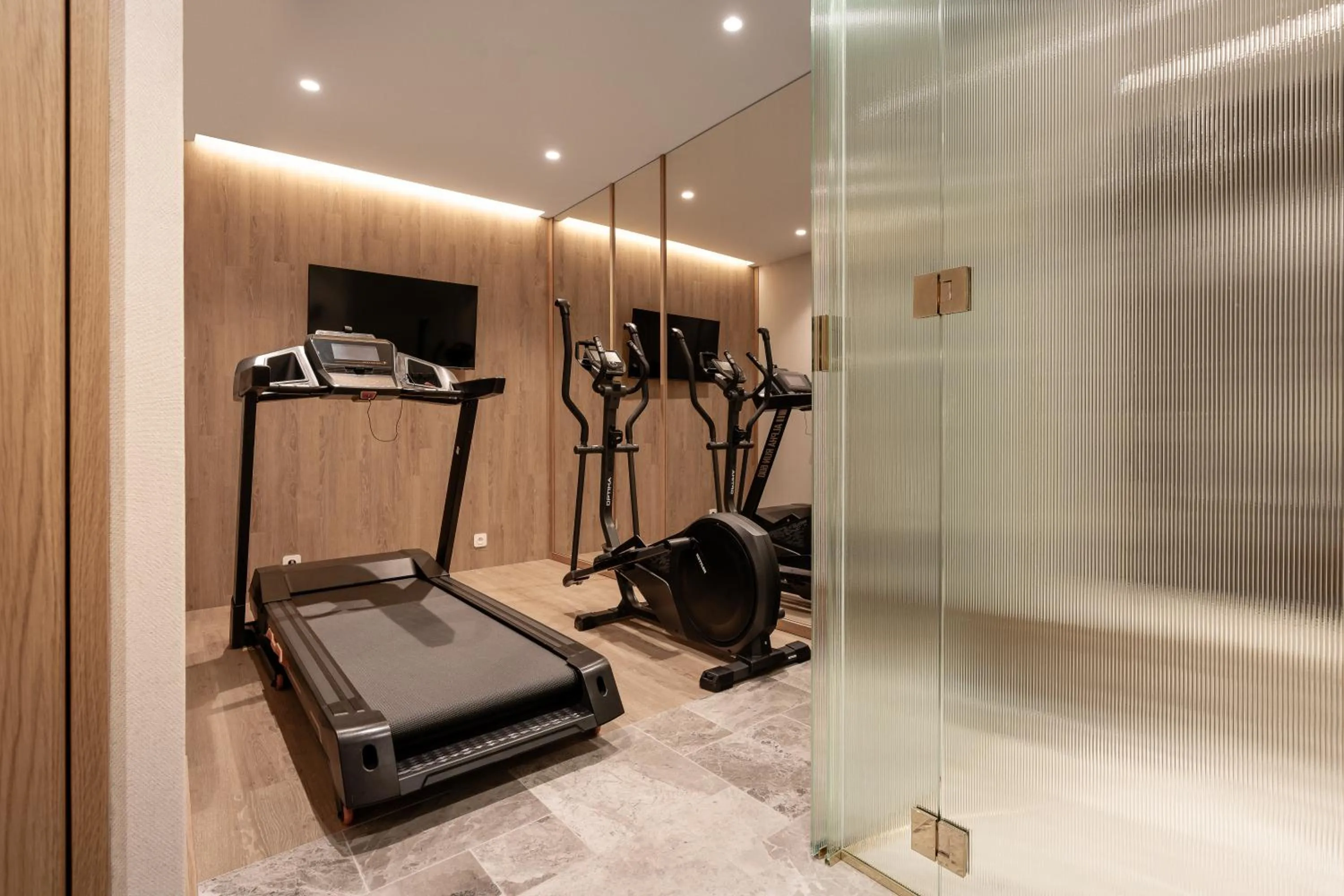 Fitness centre/facilities in Baltic Wave Boutique Apartments with sauna and gym