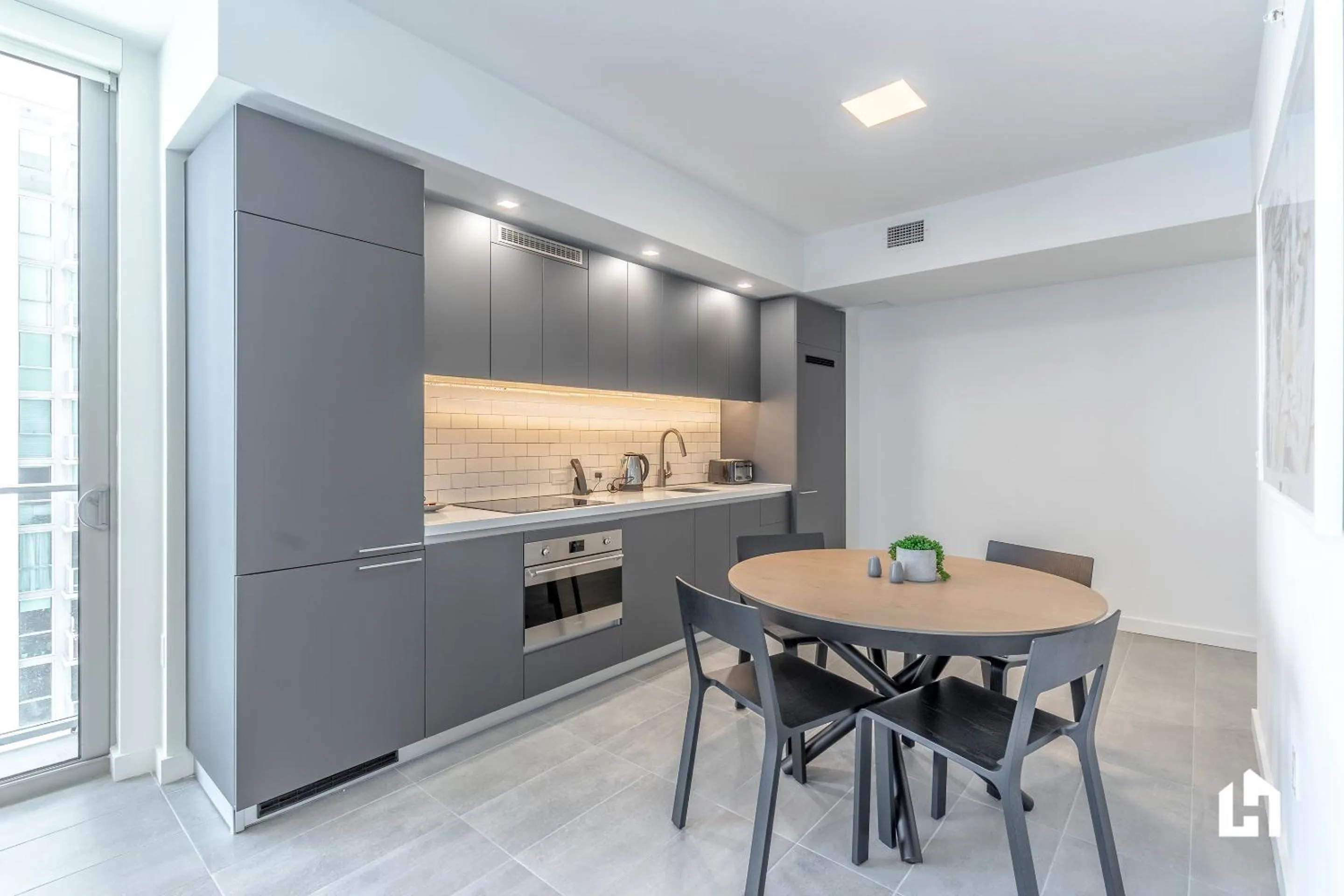 Kitchen or kitchenette in Downtown Miami Condos by Lua Host