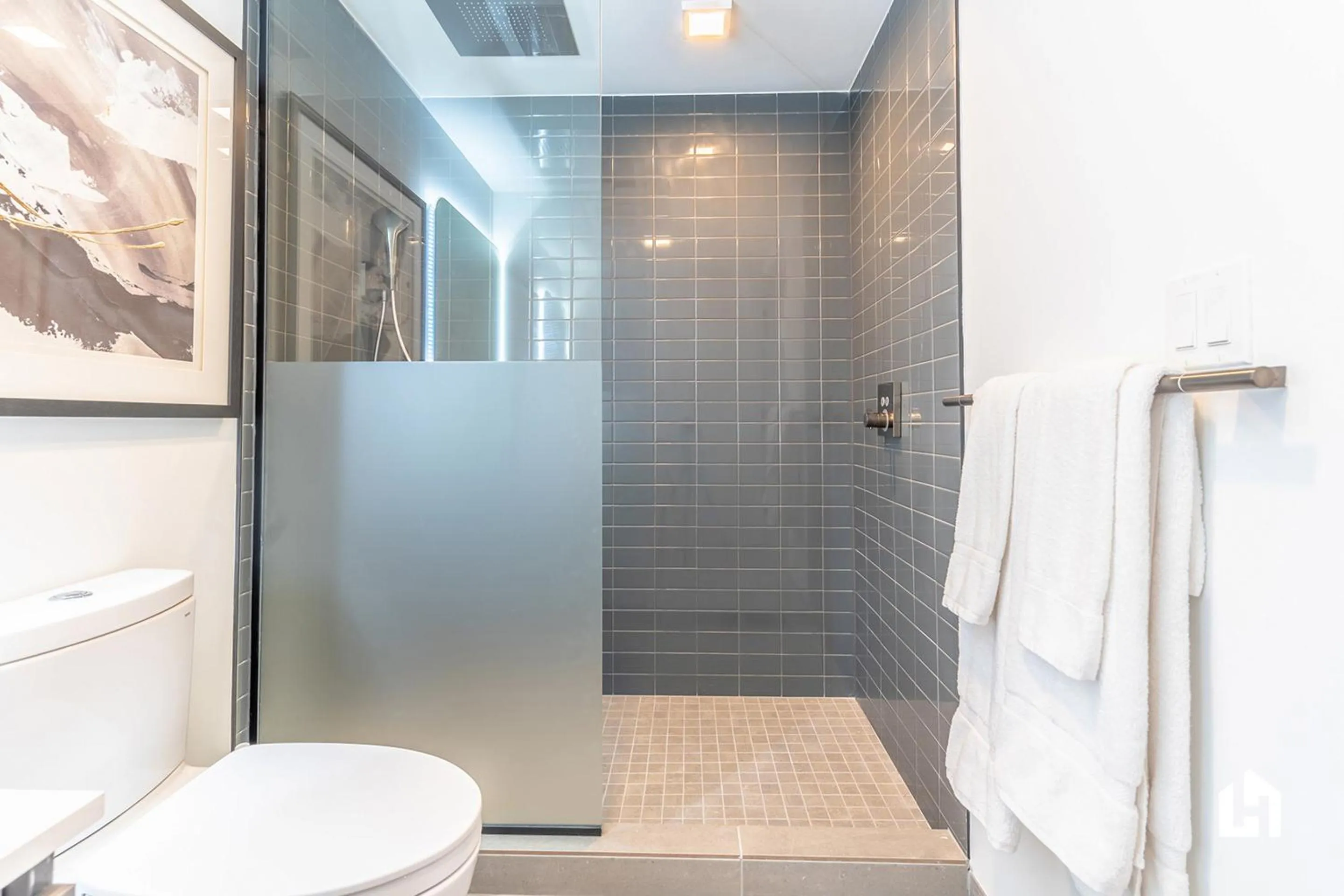 Shower in Downtown Miami Condos by Lua Host