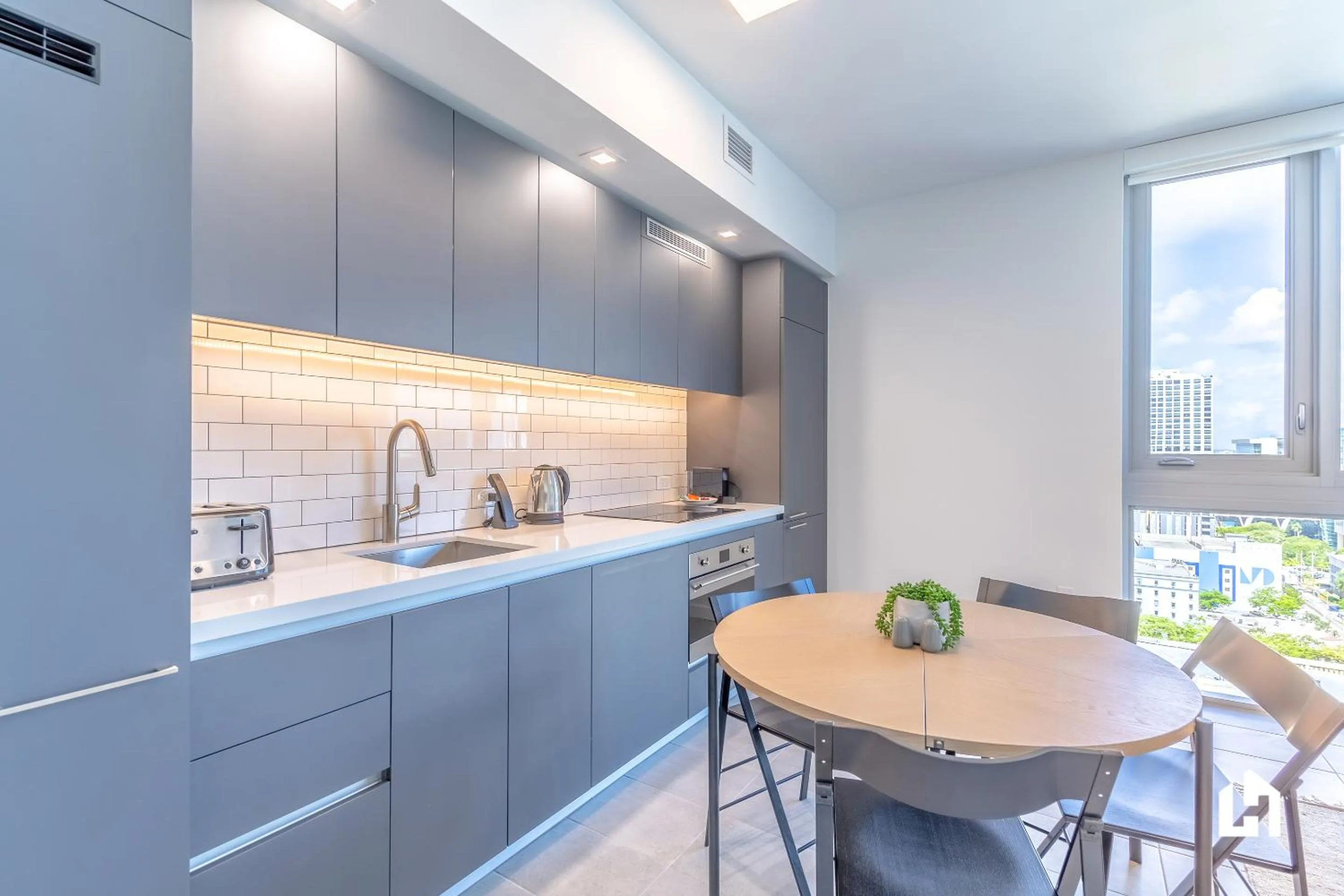 Kitchen or kitchenette in Downtown Miami Condos by Lua Host