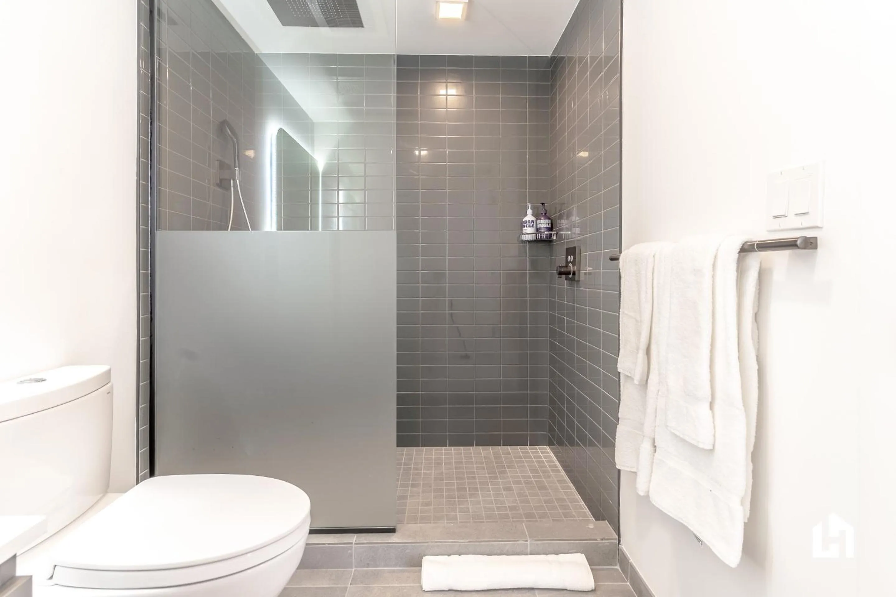 Shower in Downtown Miami Condos by Lua Host