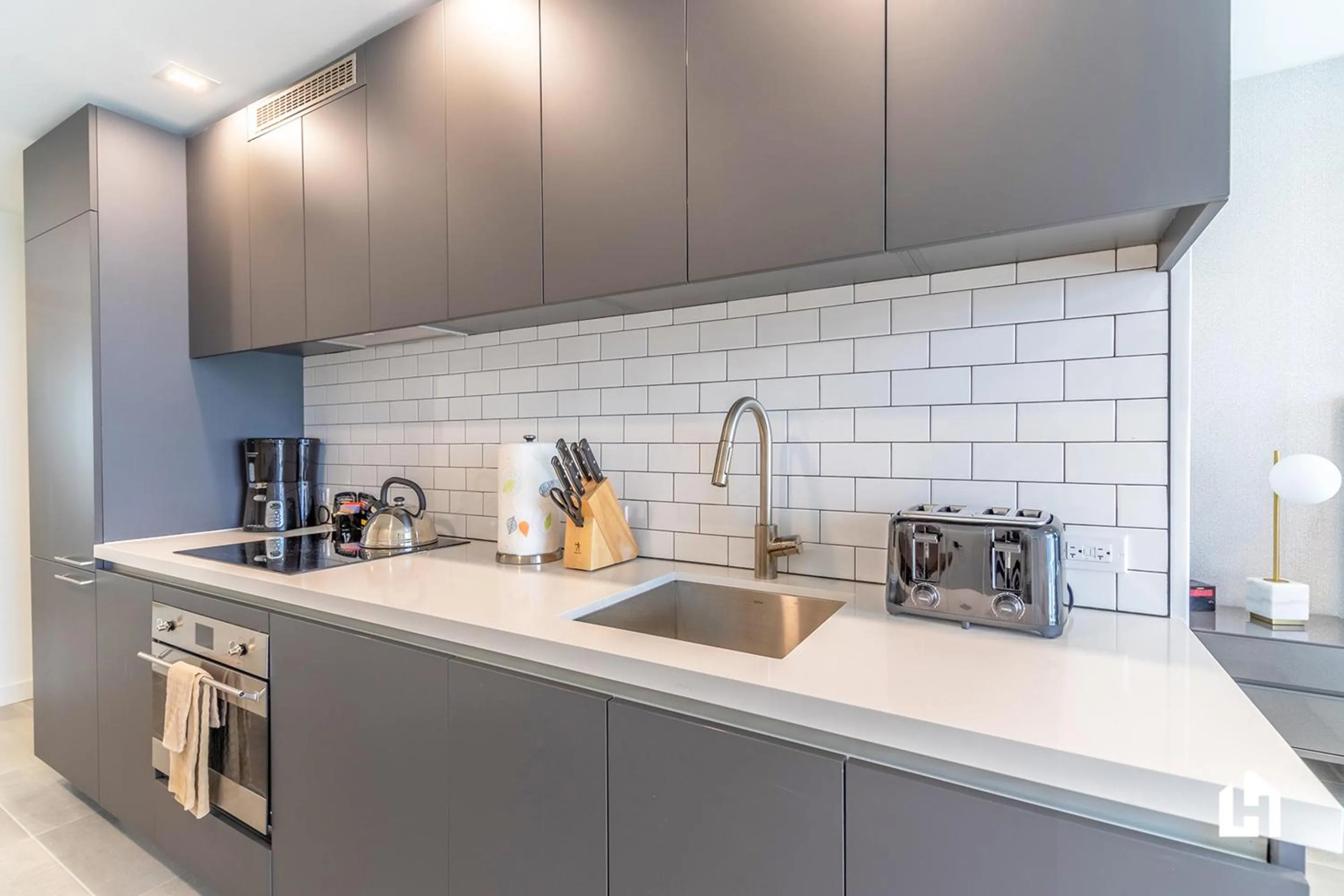 Kitchen or kitchenette in Downtown Miami Condos by Lua Host