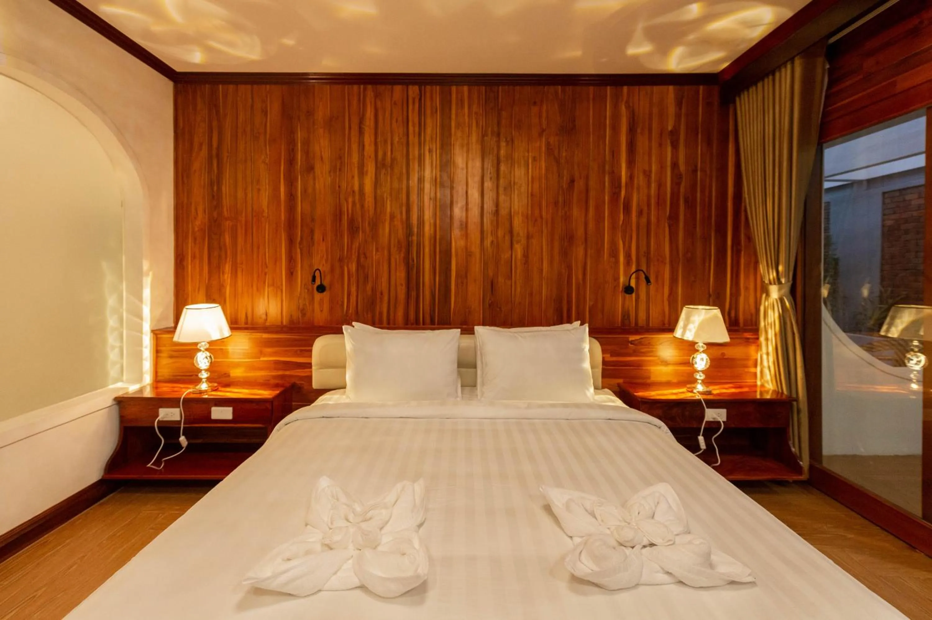 Bed in LuangPrabang Center Hotel