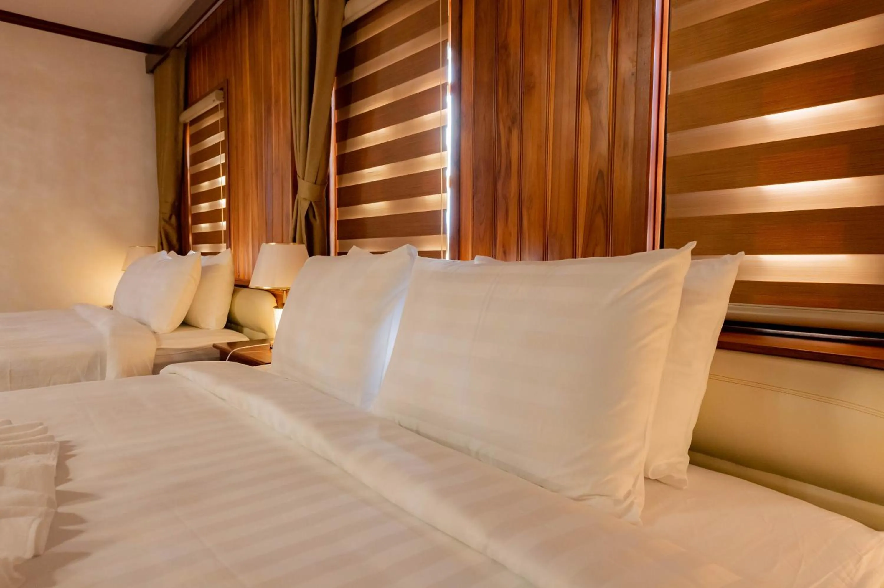 Bed in LuangPrabang Center Hotel