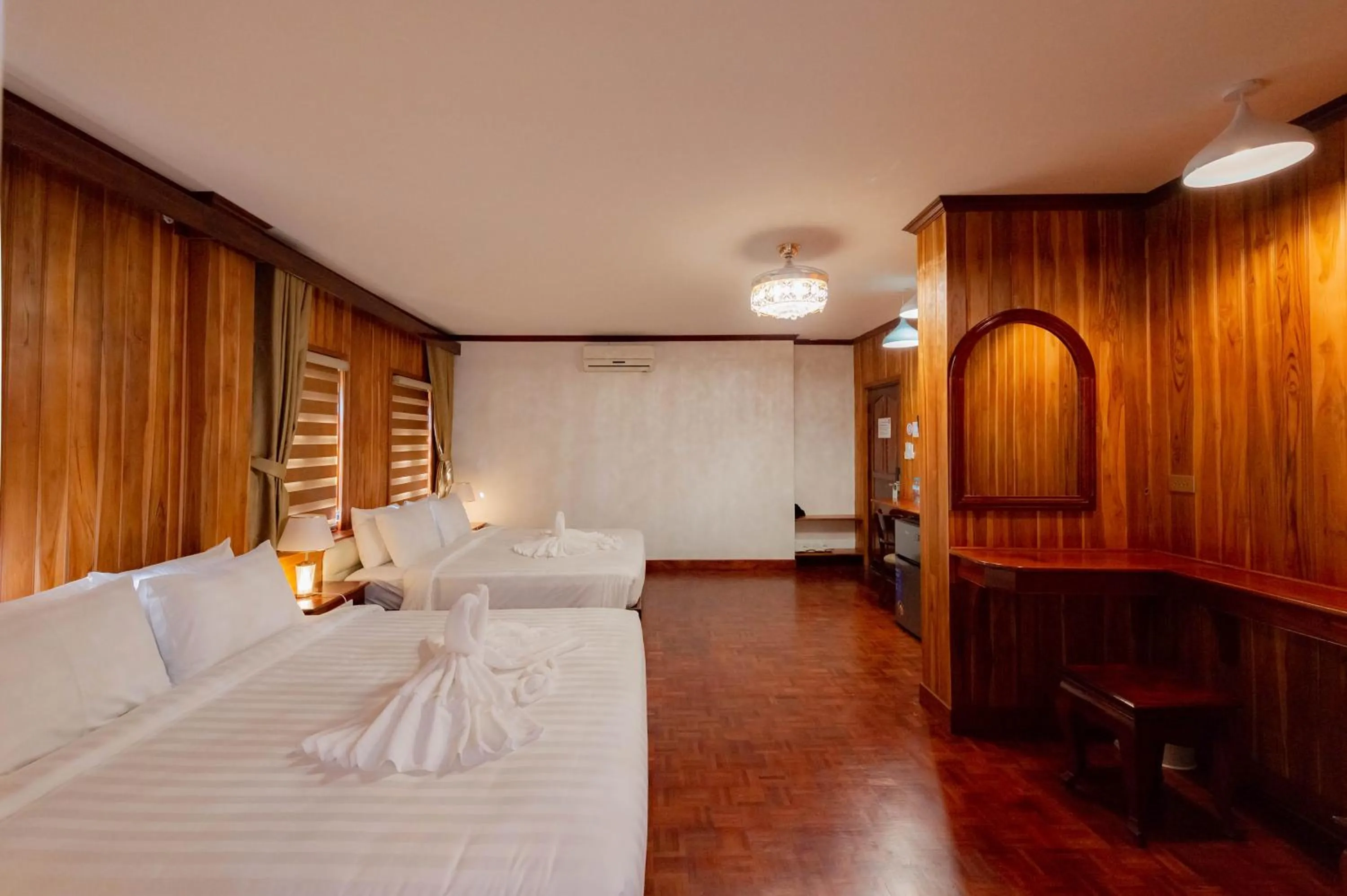 Photo of the whole room, Bed in LuangPrabang Center Hotel