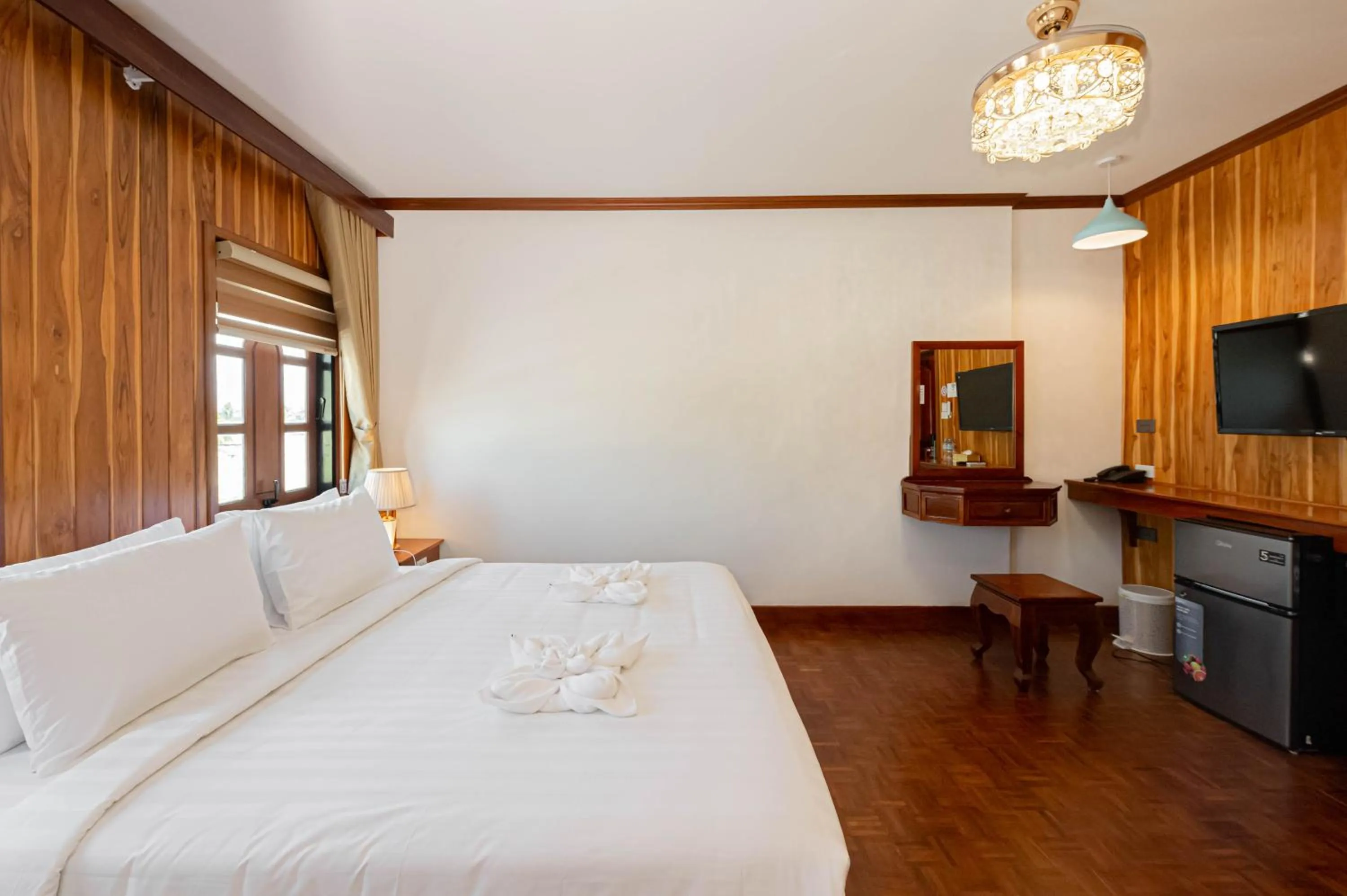Photo of the whole room, Bed in LuangPrabang Center Hotel