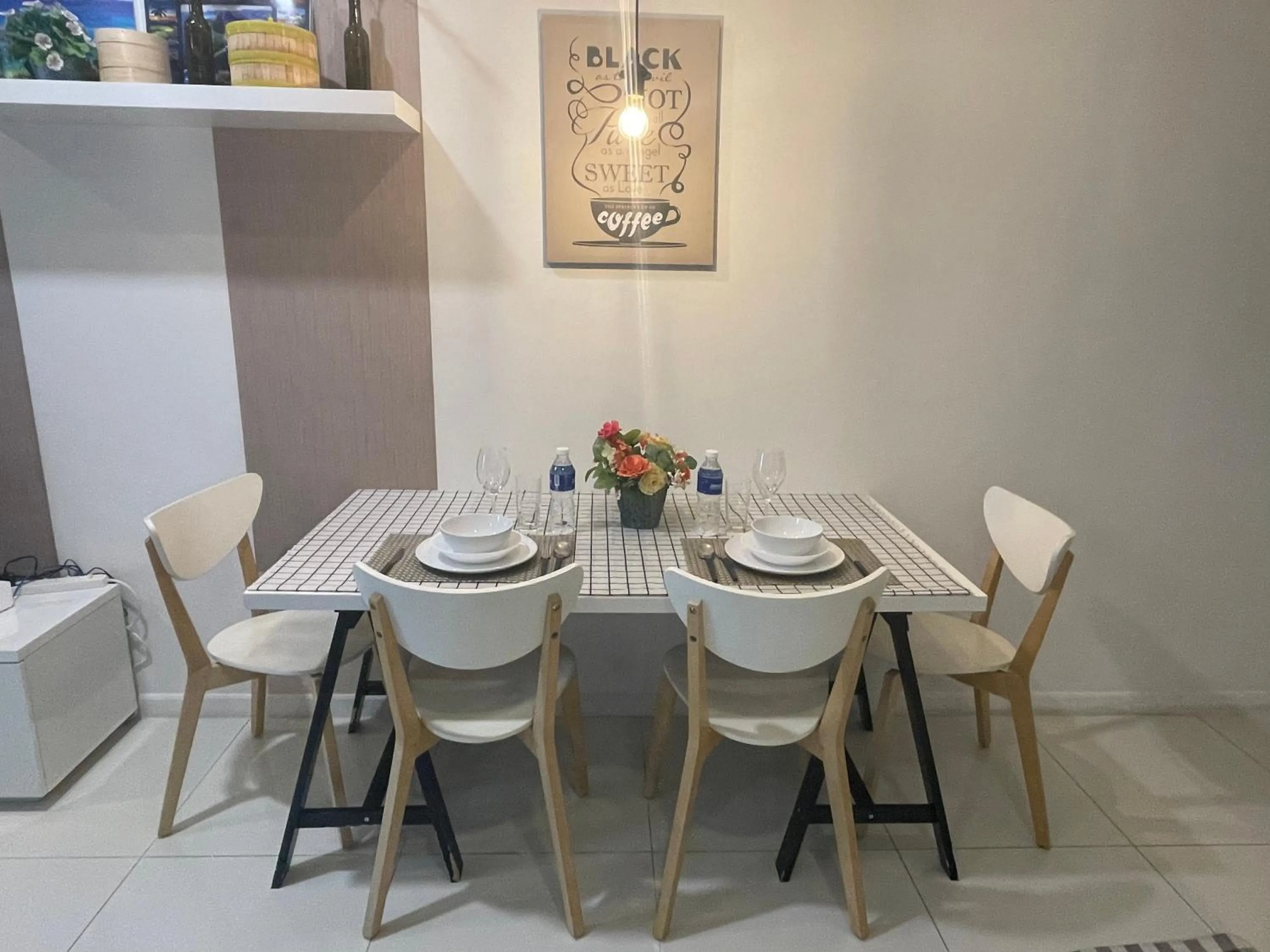 Dining area in Mercu Summer Suite KLCC by Kuminshu