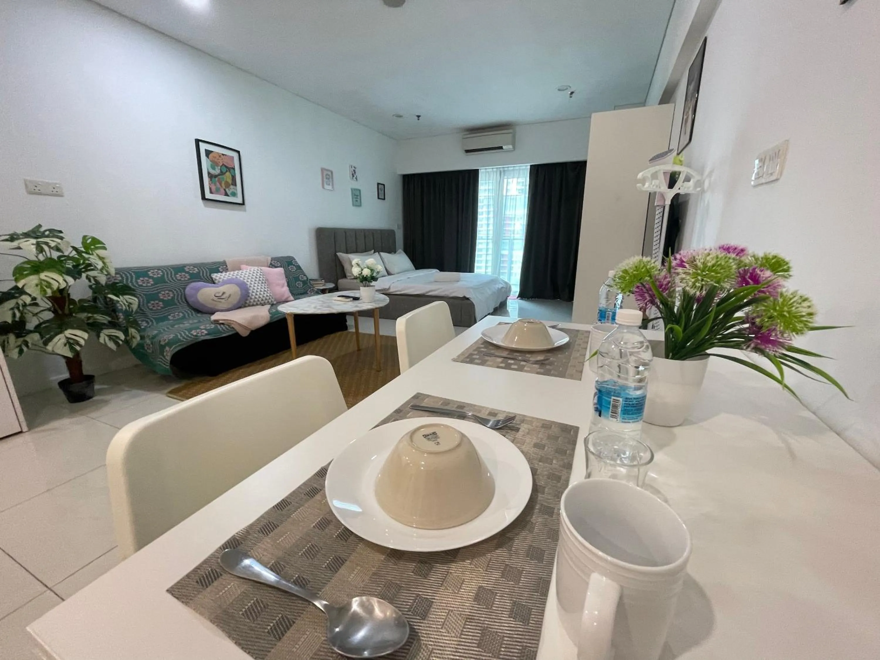 Dining area in Mercu Summer Suite KLCC by Kuminshu