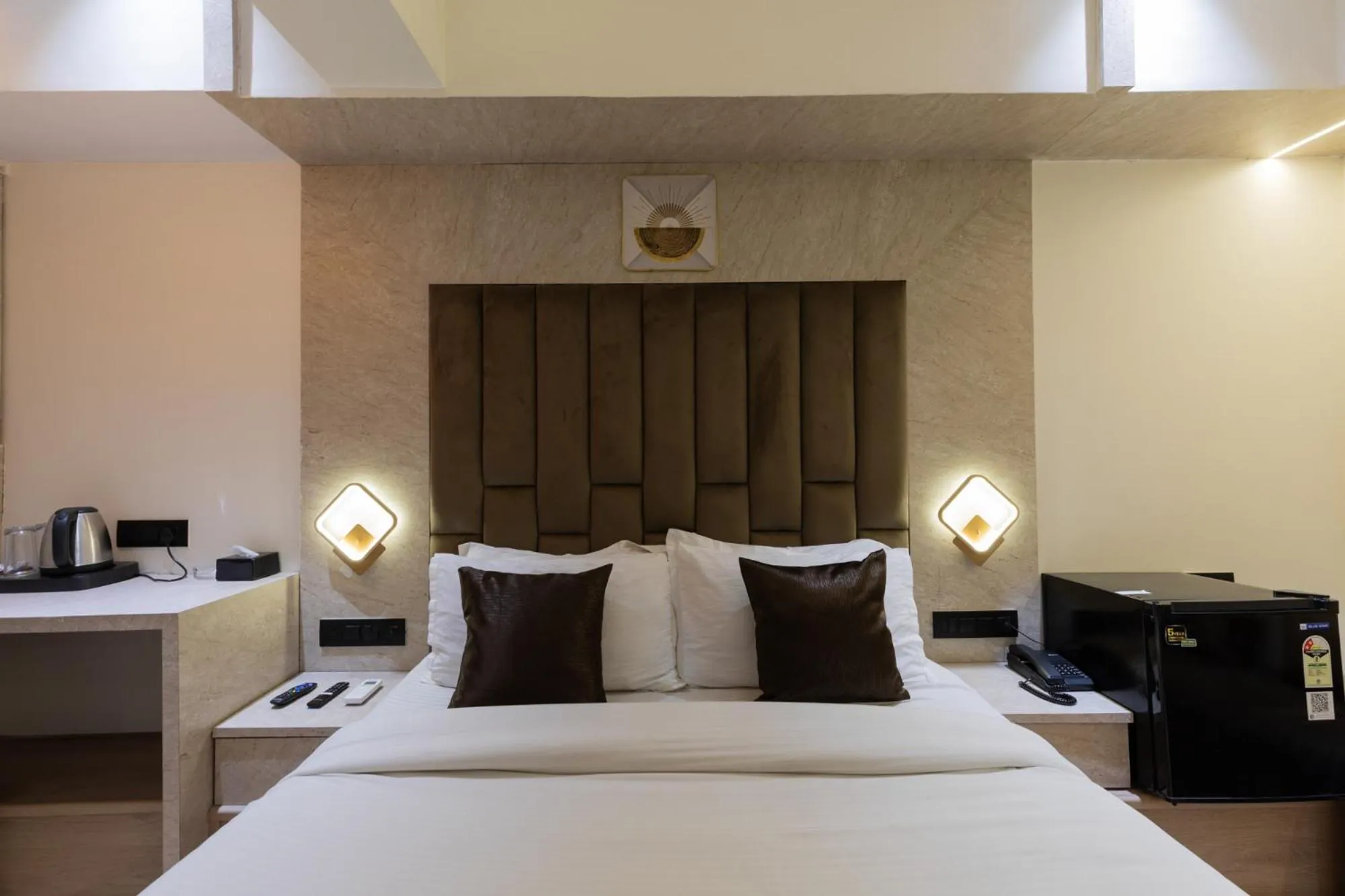 Bed in Hotel Larmont Luxury