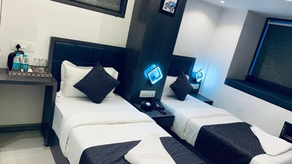 Bed in Hotel Larmont Luxury