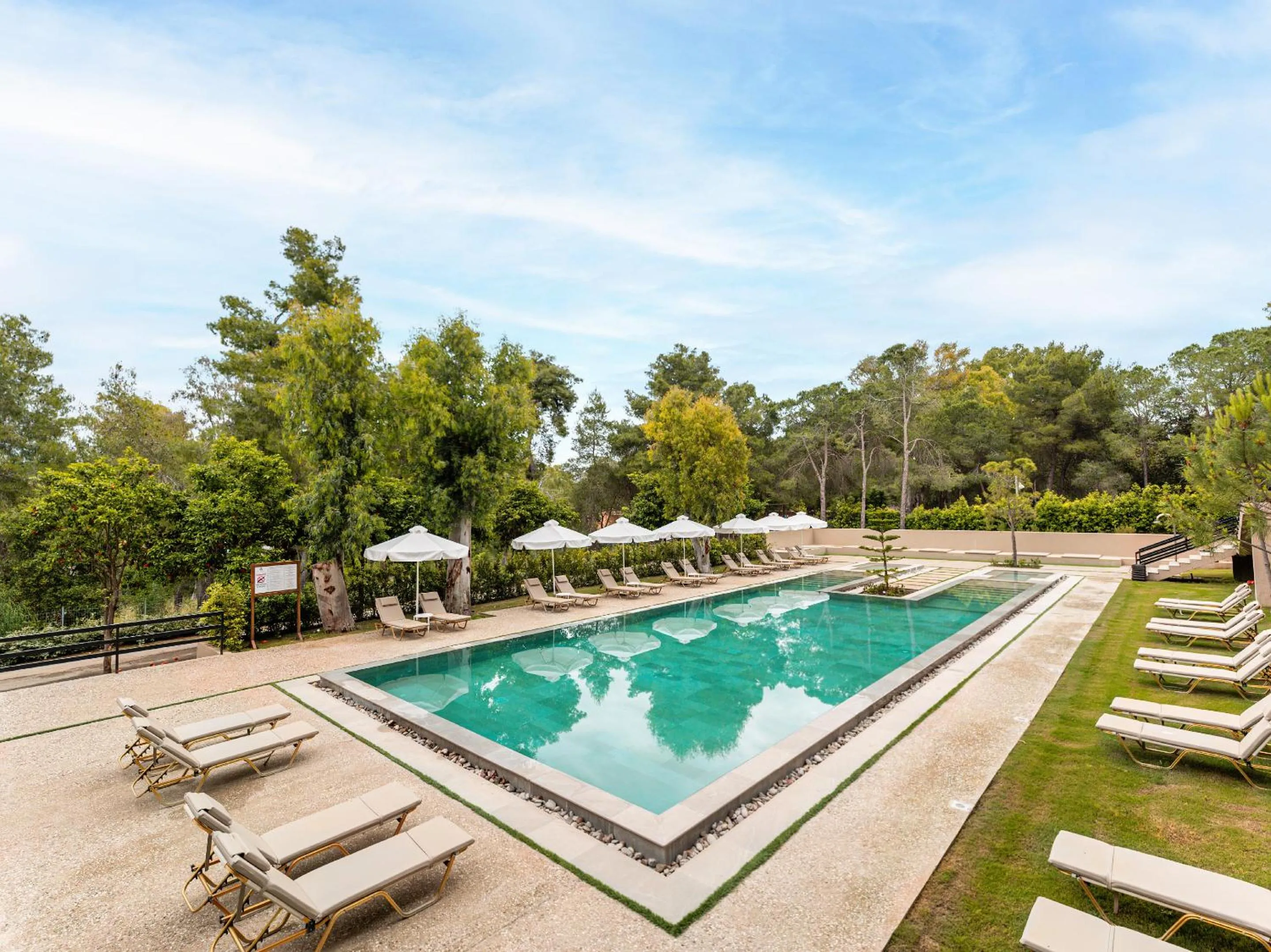 Swimming pool in Grecotel LUXME Palms at Riviera Olympia & Aqua Park