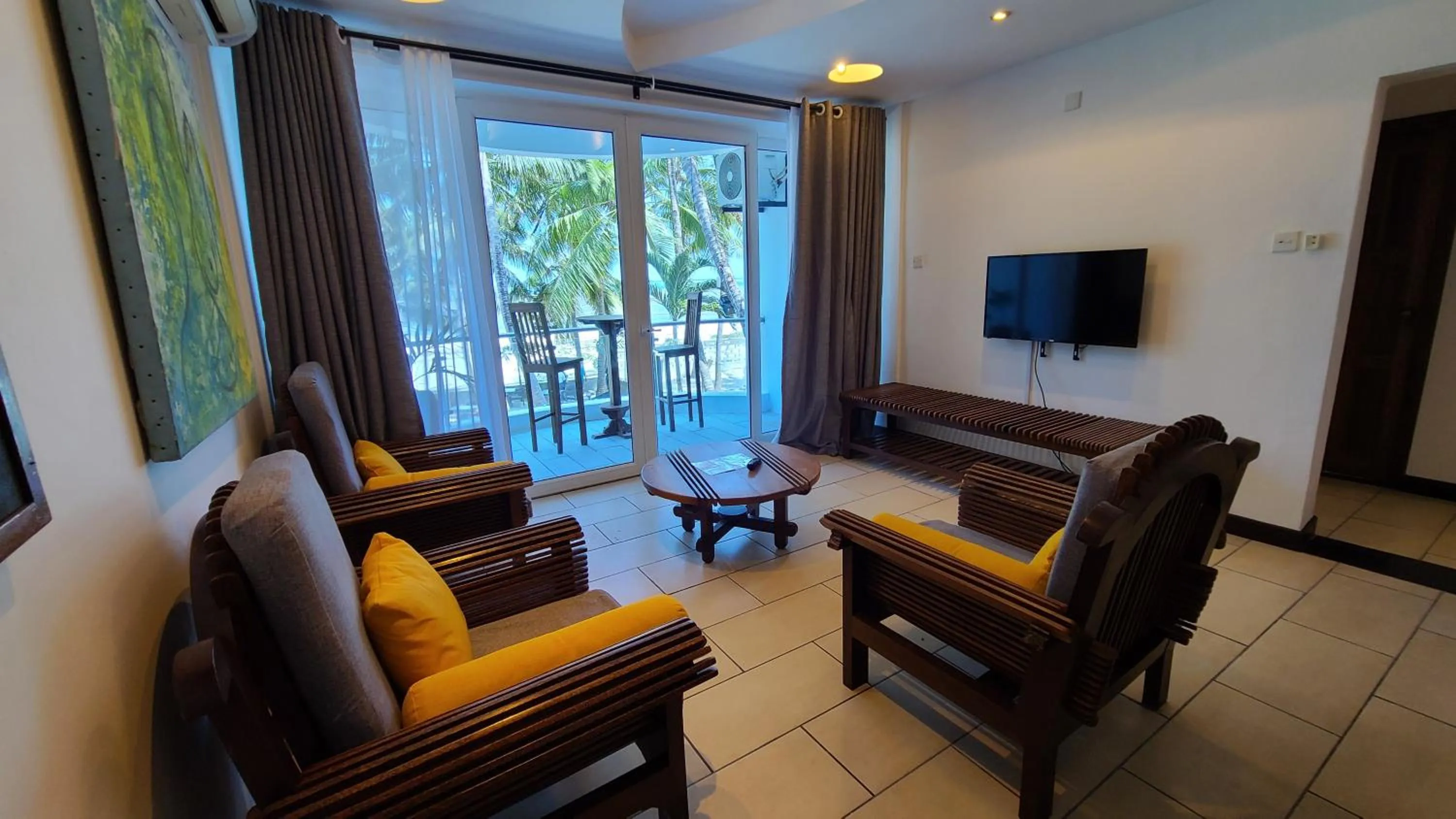 Communal lounge/ TV room in c3 Cowrie Shell Residences
