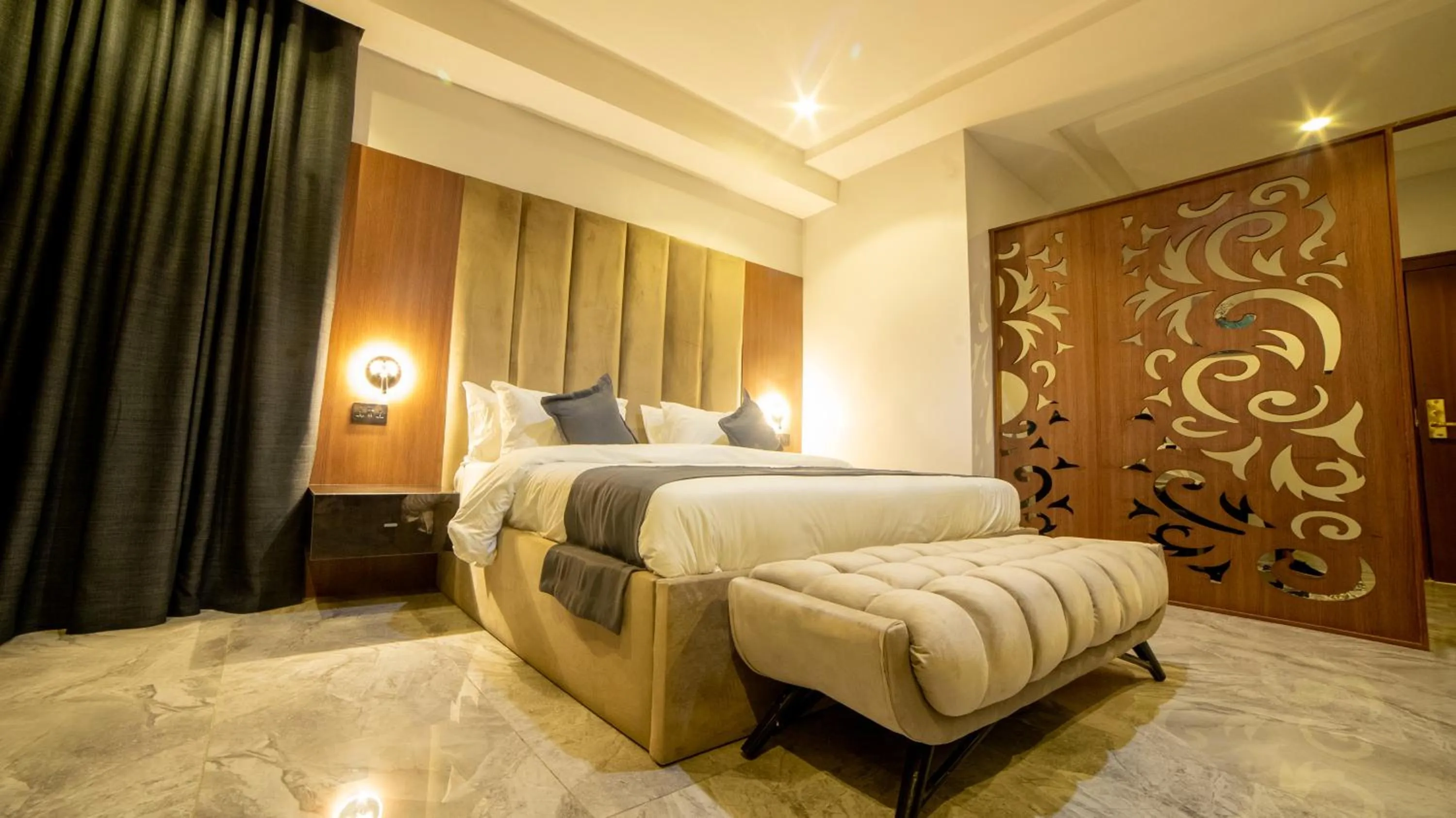 Bed in Tranquila Hotels and Suites Abuja