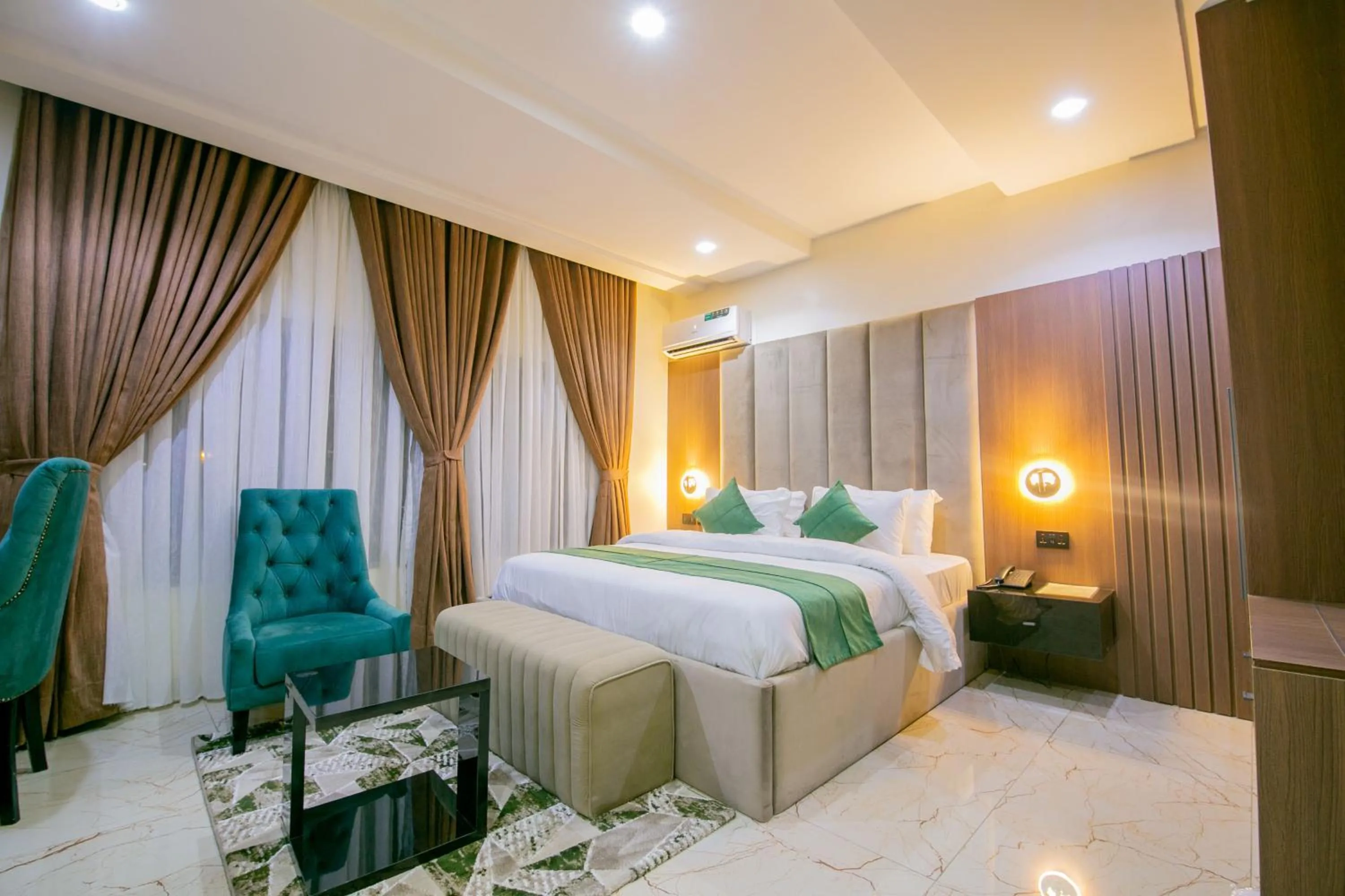 Bed in Tranquila Hotels and Suites Abuja