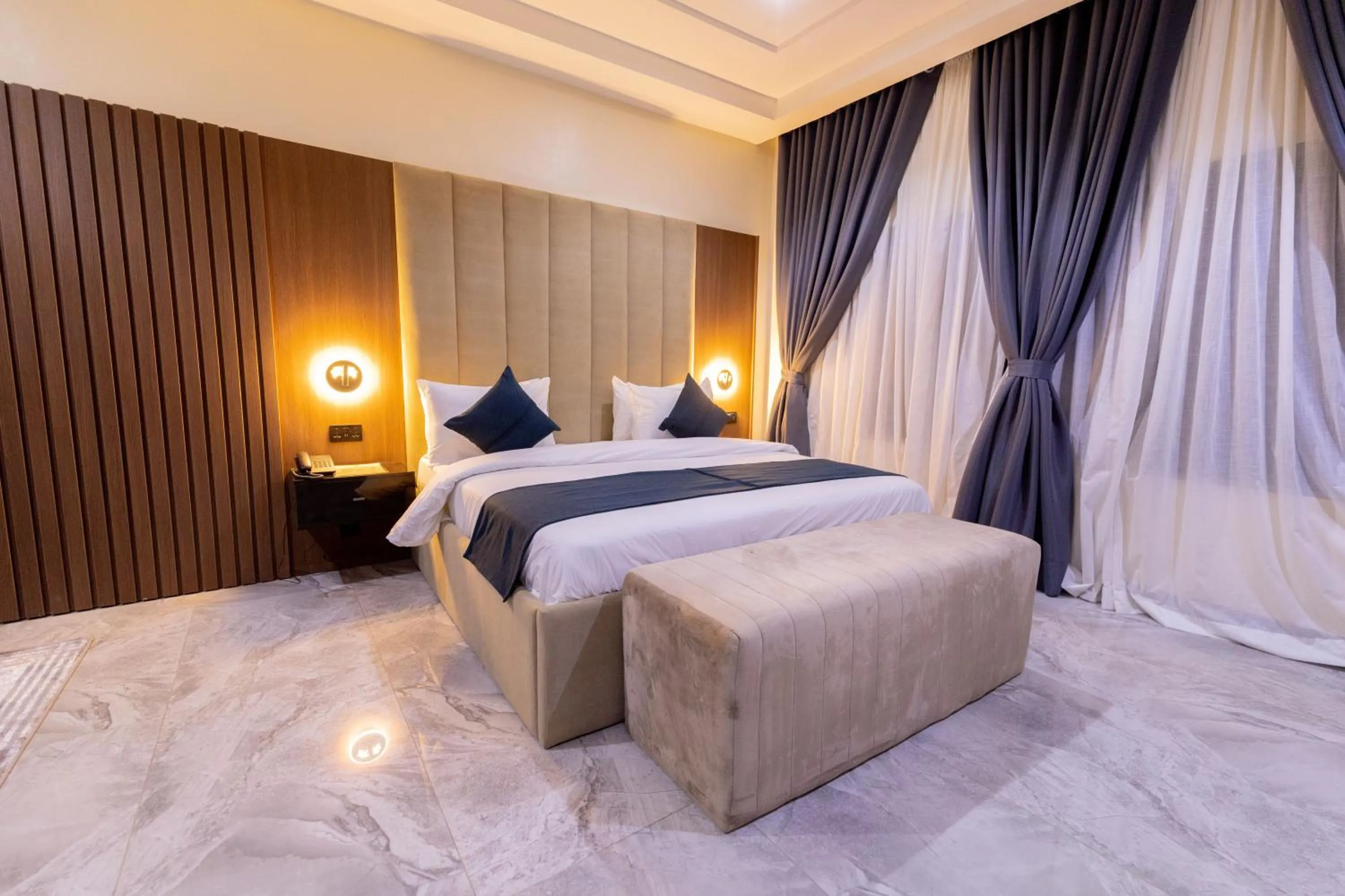 Bed in Tranquila Hotels and Suites Abuja