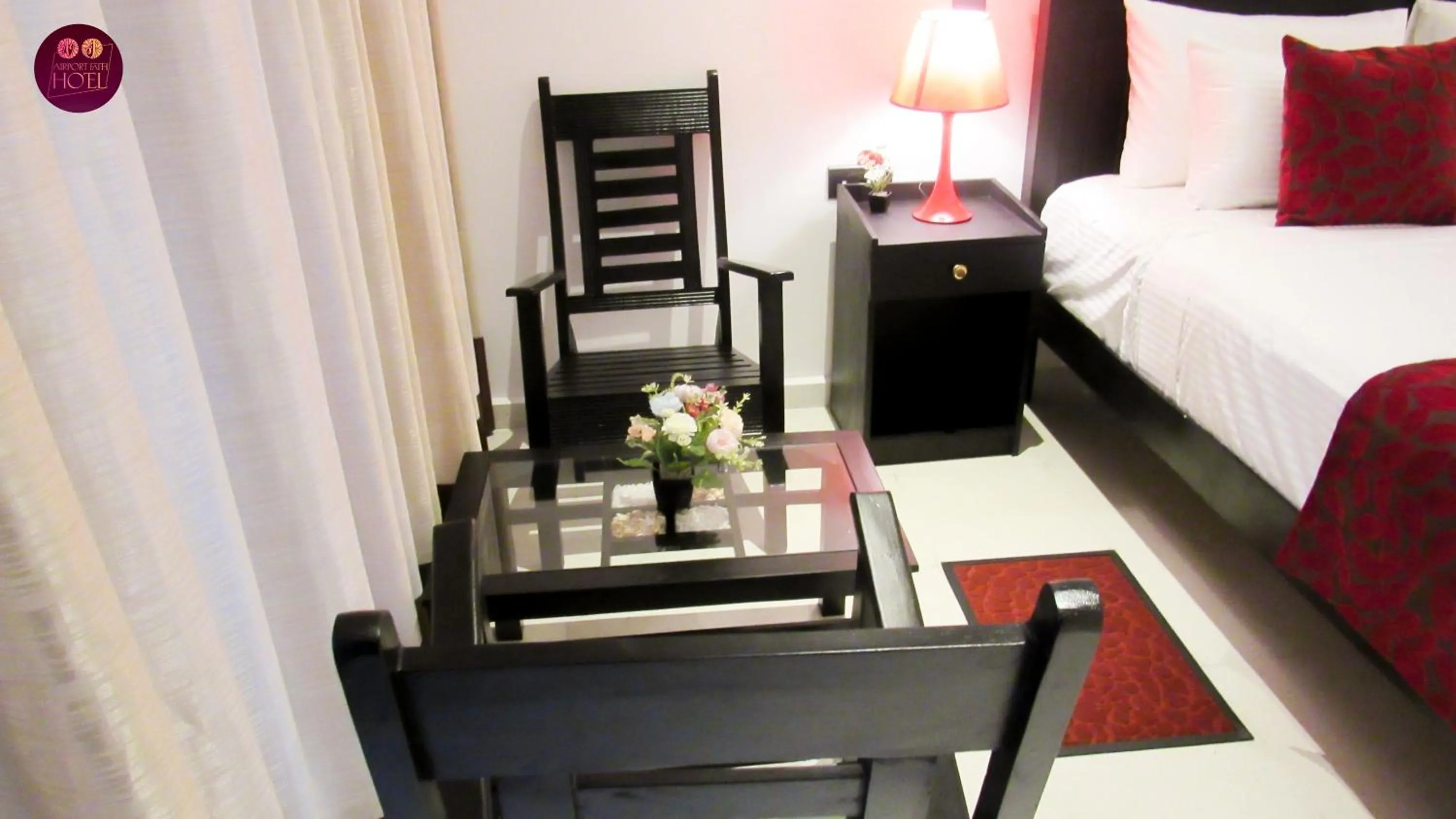 Seating area, Bed in Airport Faith Hotel