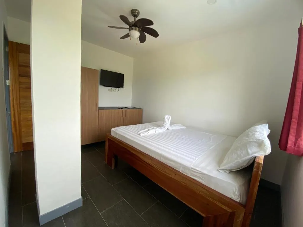 Bed in Malipaj Apartments