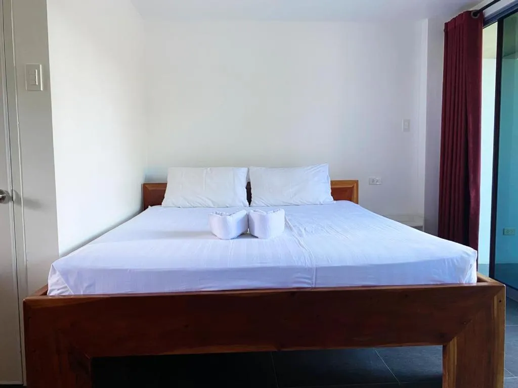 Bed in Malipaj Apartments