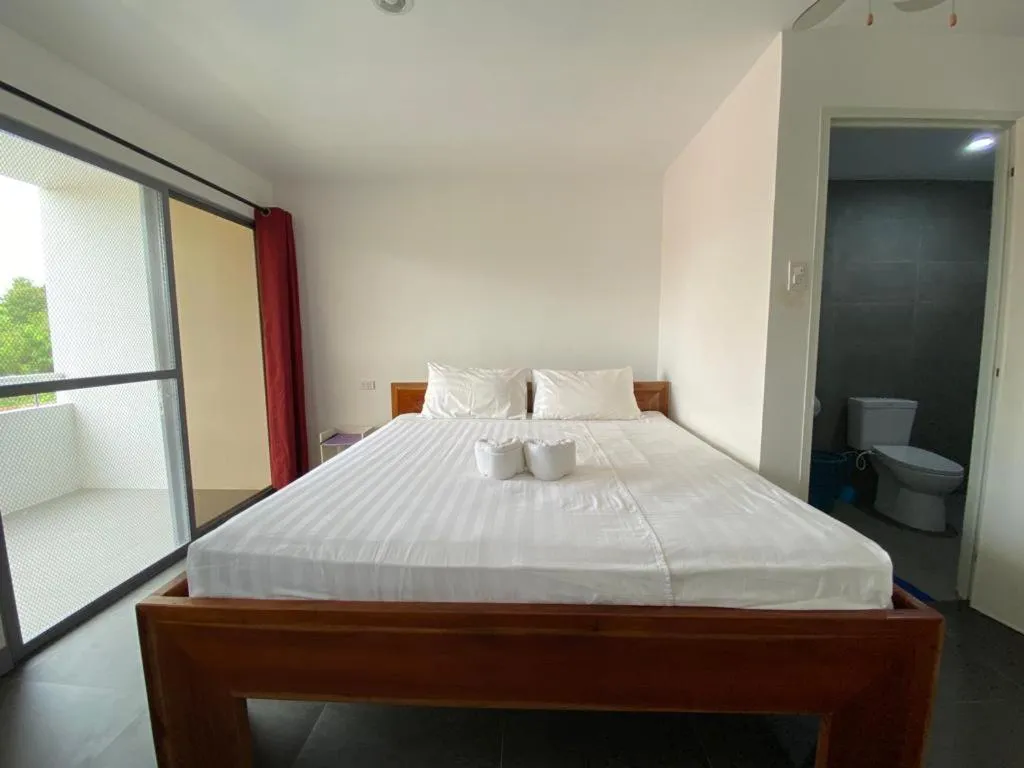 Bed in Malipaj Apartments