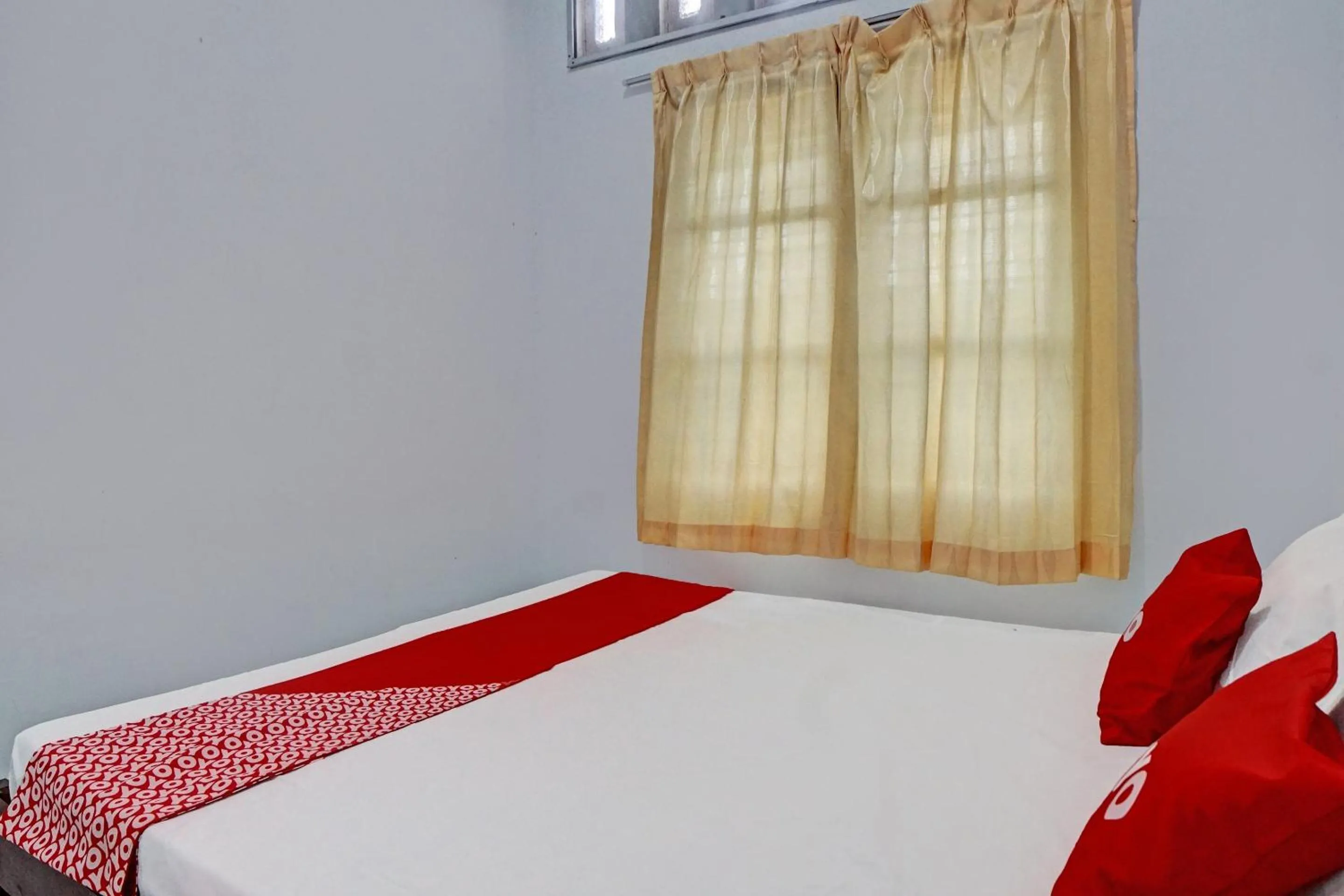 Bedroom in Hotel O Vania Guest HouseNearRSUP H Adam Malik