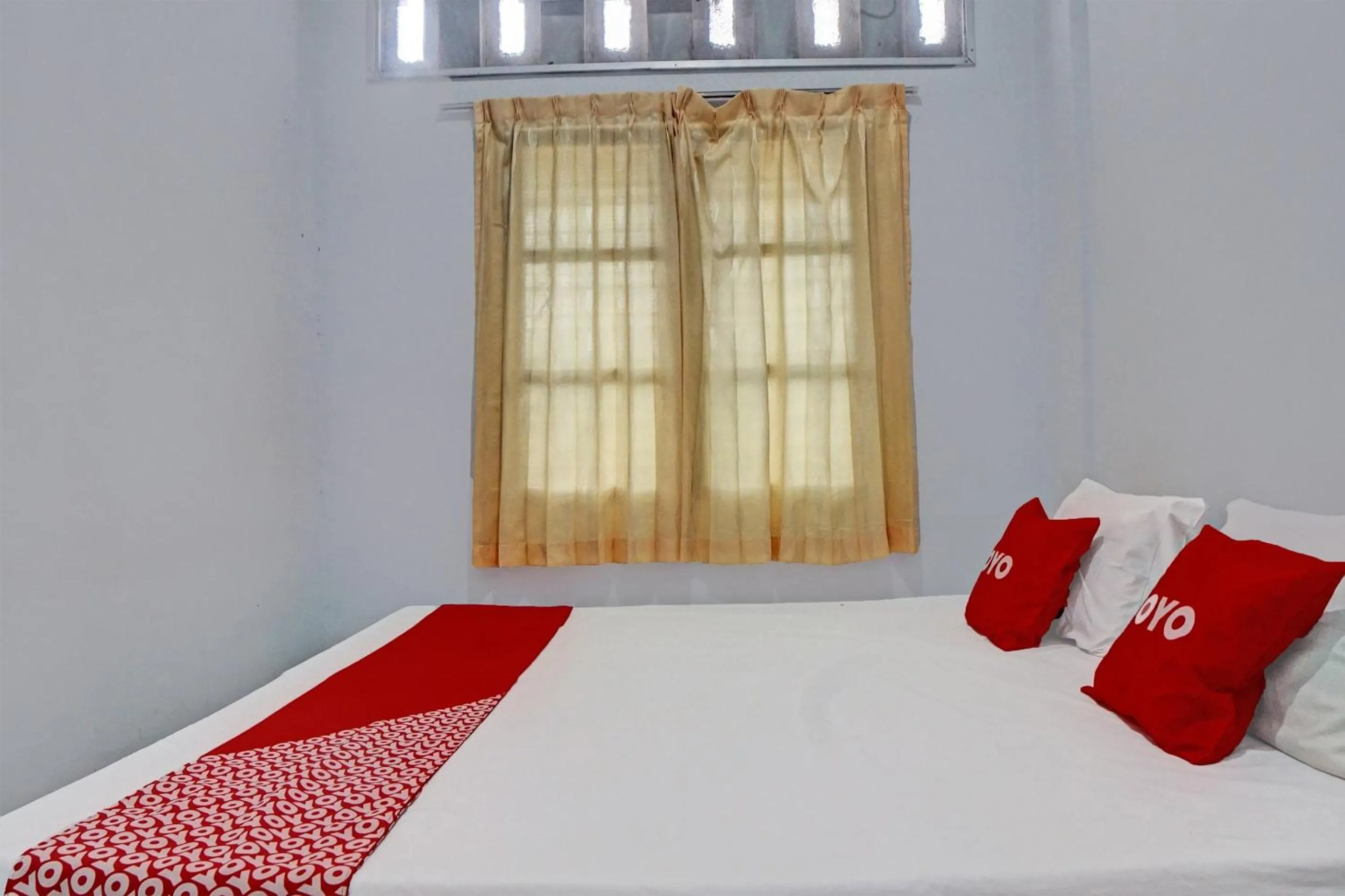 Bedroom in Hotel O Vania Guest HouseNearRSUP H Adam Malik