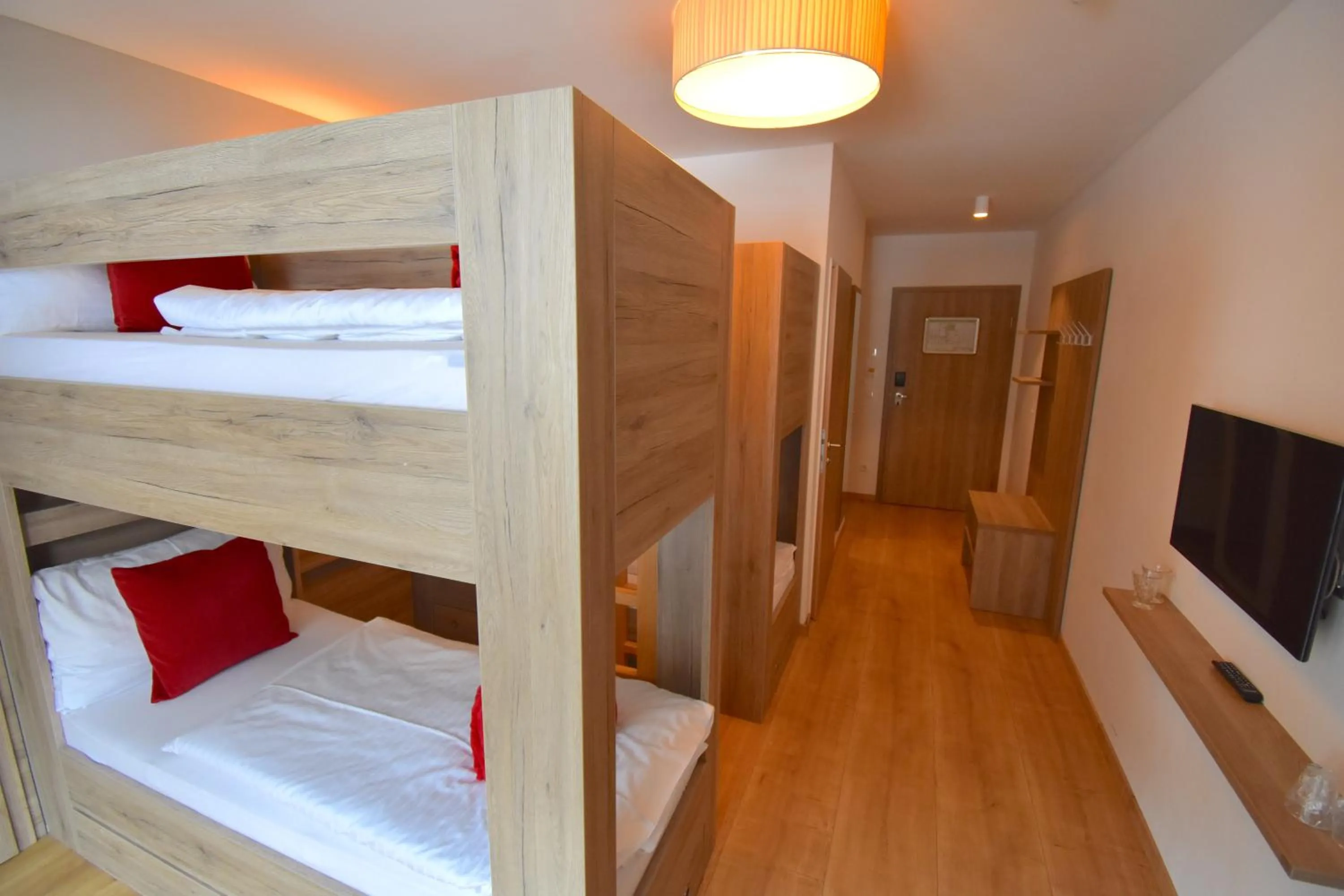 Photo of the whole room, Bed in Sporthotel Zederhaus im Lungau