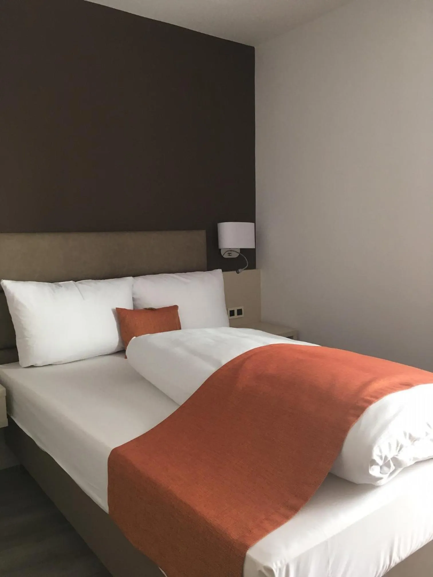 Bed in Hotel Kapuzinerhof