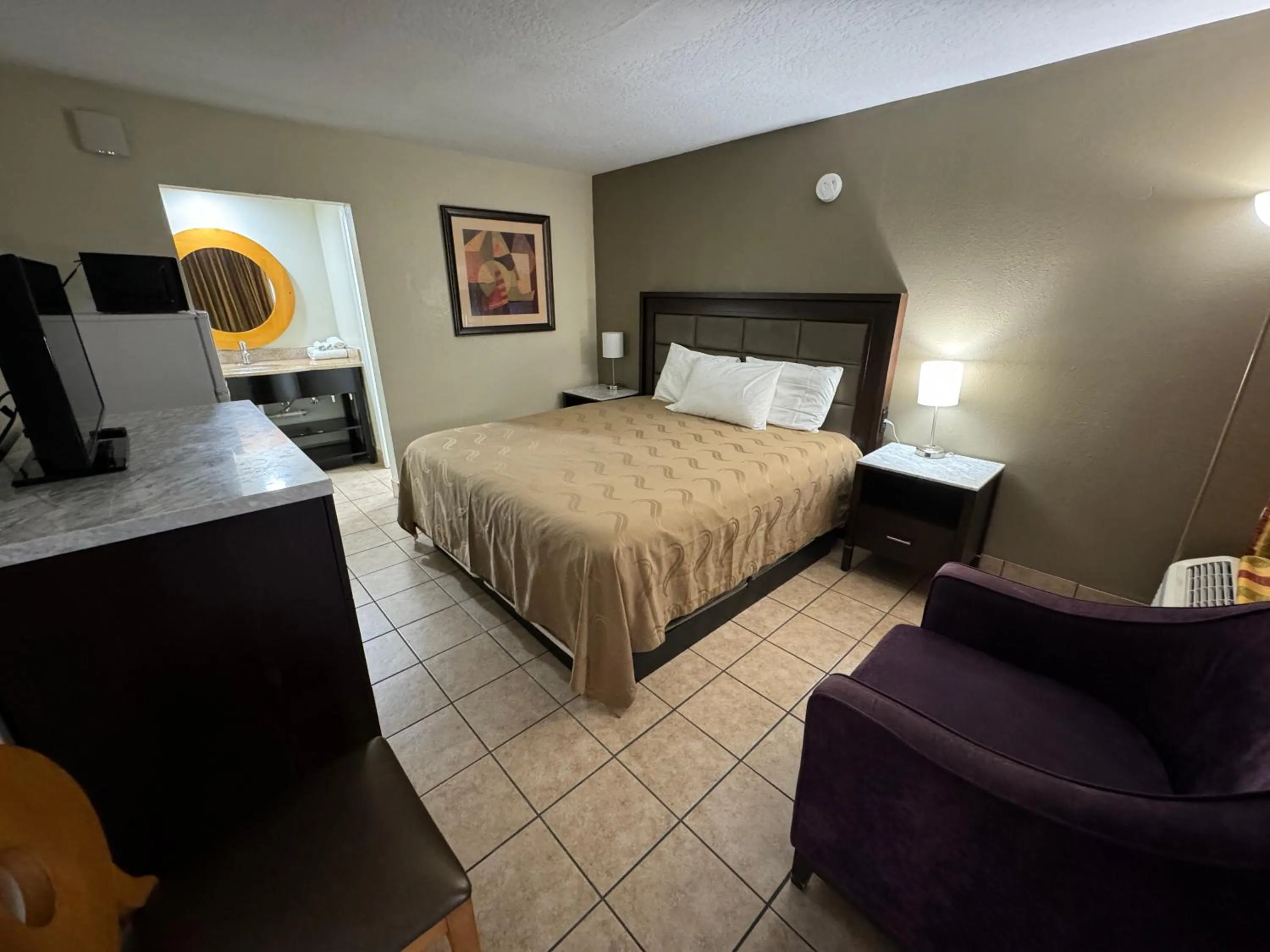 Bed in River Palm Hotel