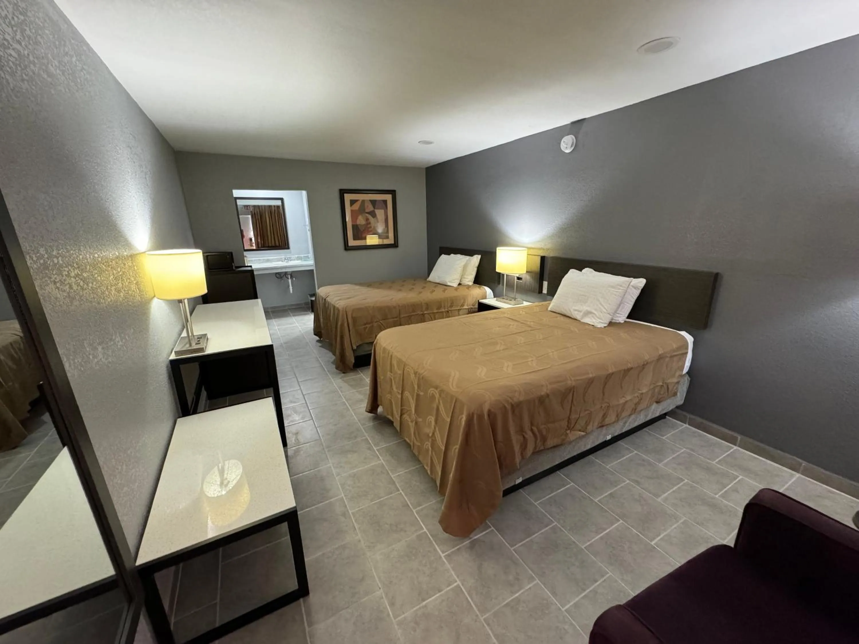 Bed in River Palm Hotel