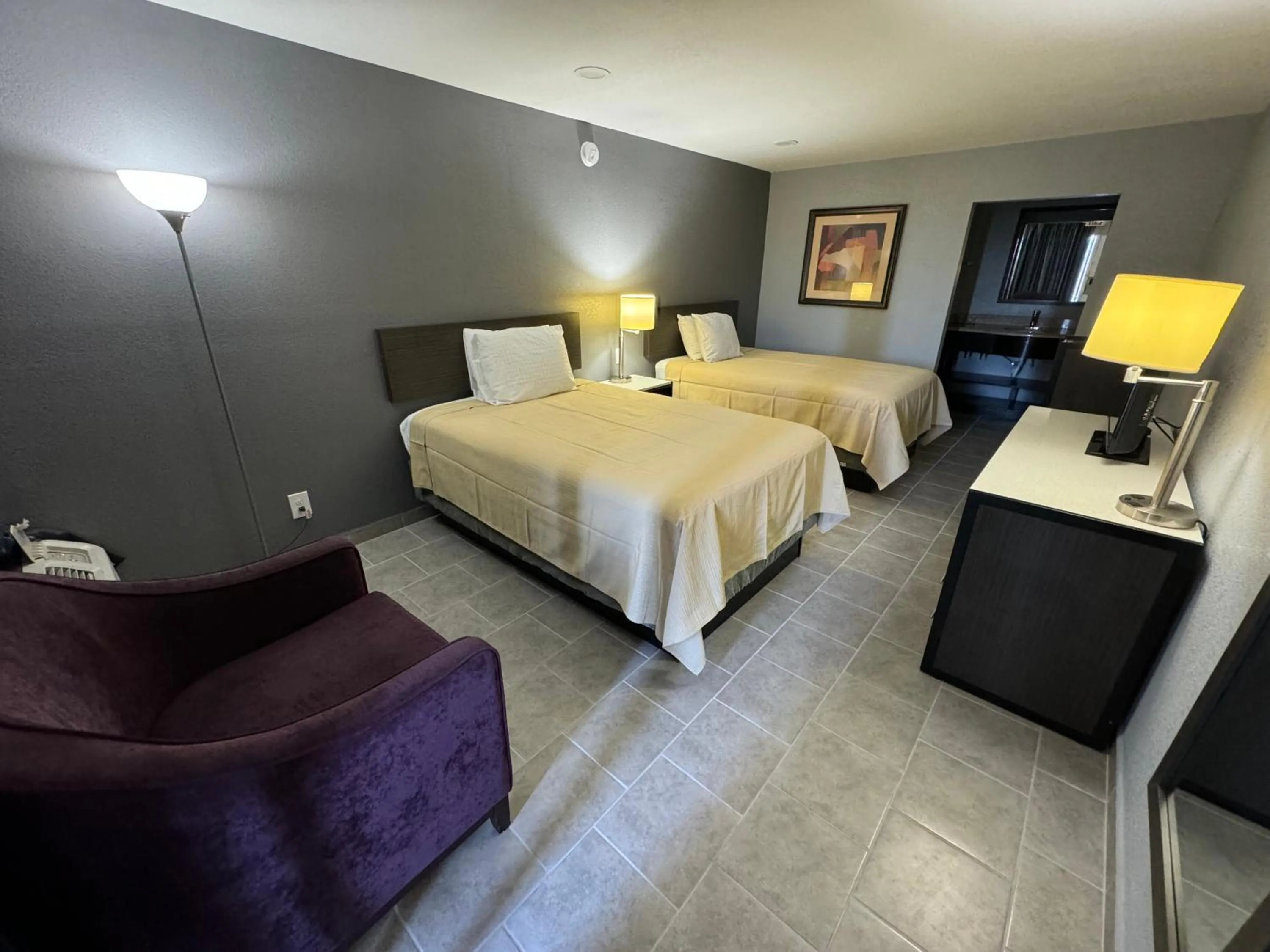 Bed in River Palm Hotel