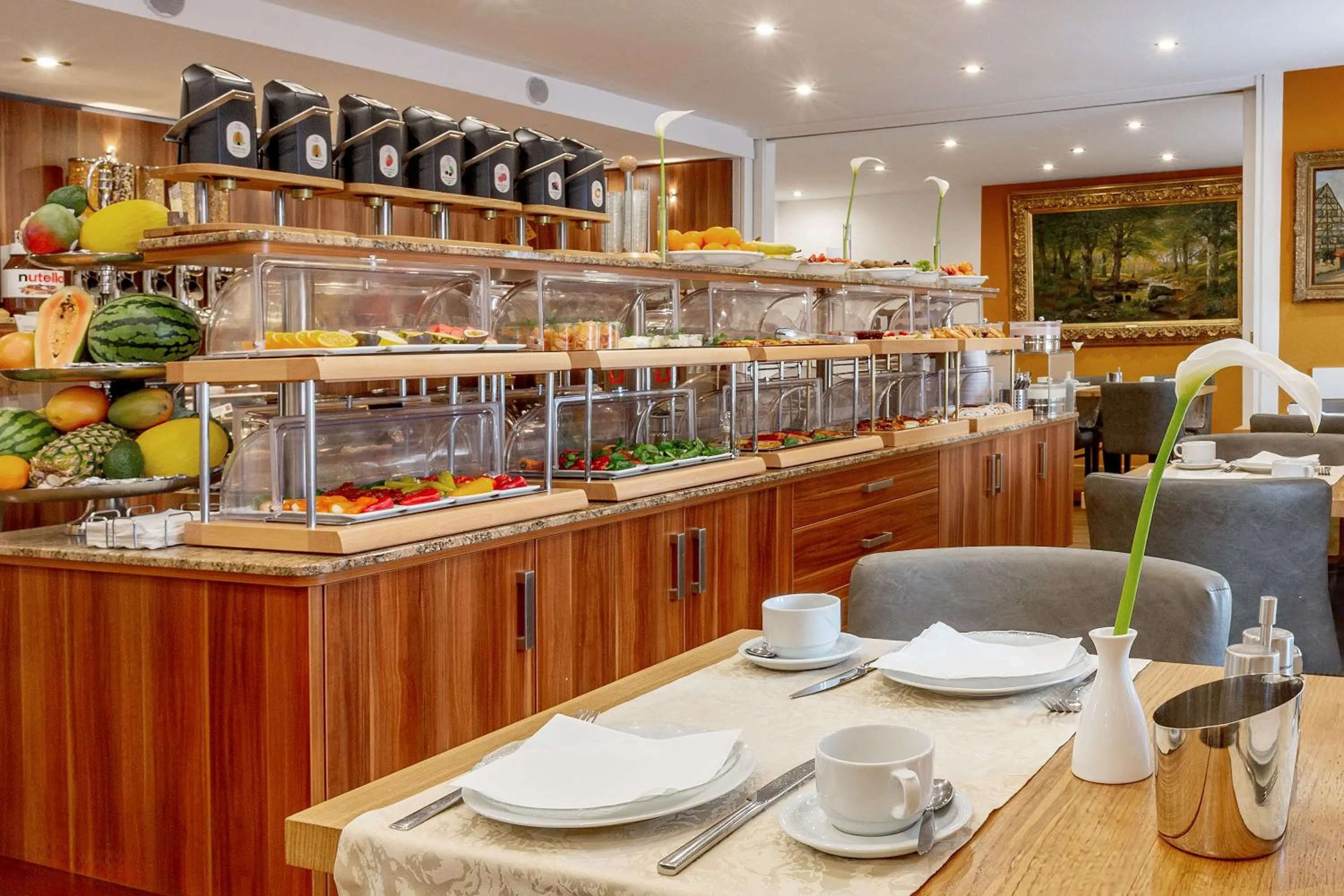 Buffet breakfast in TIPTOP Hotel Burgschmiet Garni