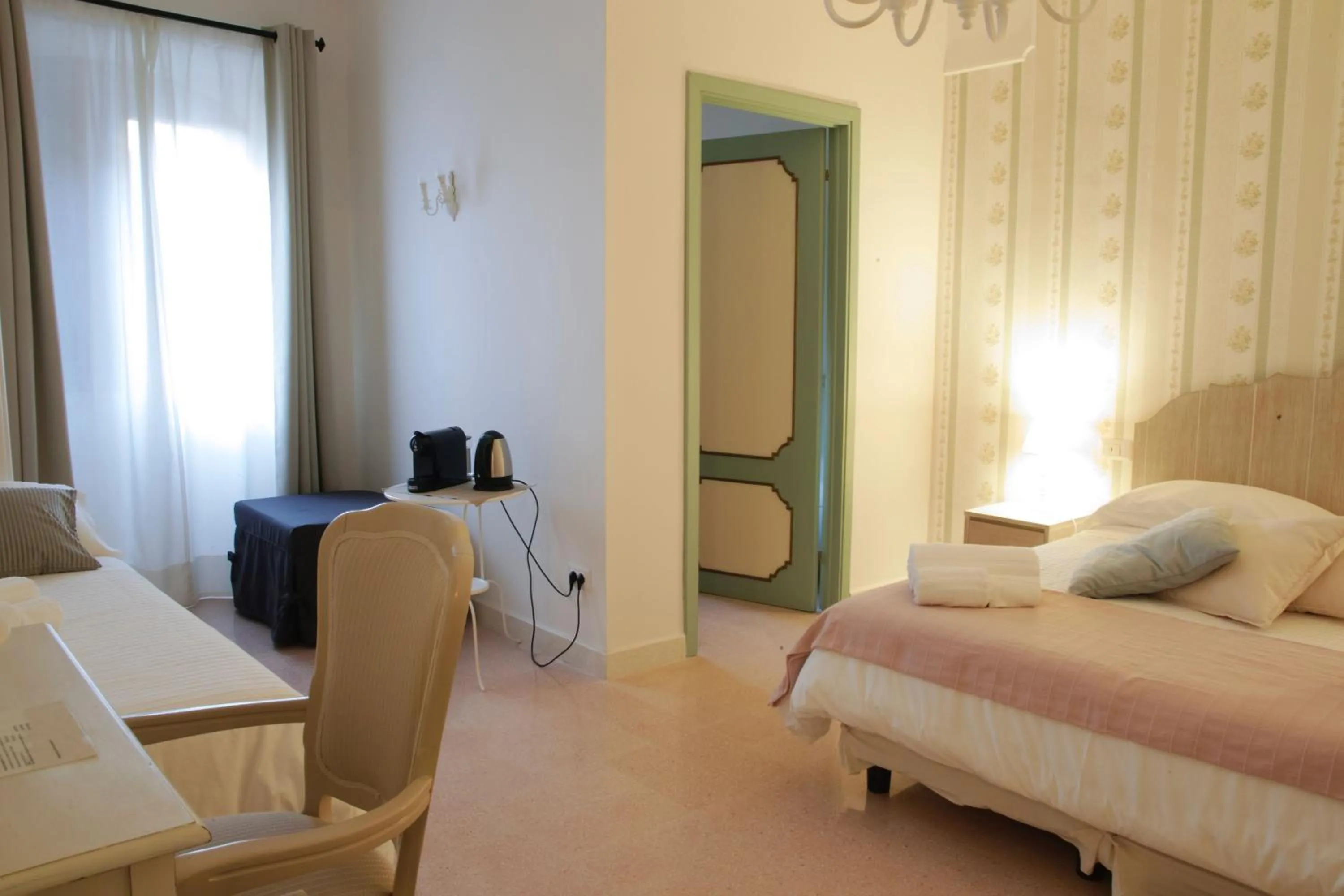 Standard Quadruple Room - single occupancy in PALAZZO ALESSANDRINI GUEST HOUSE