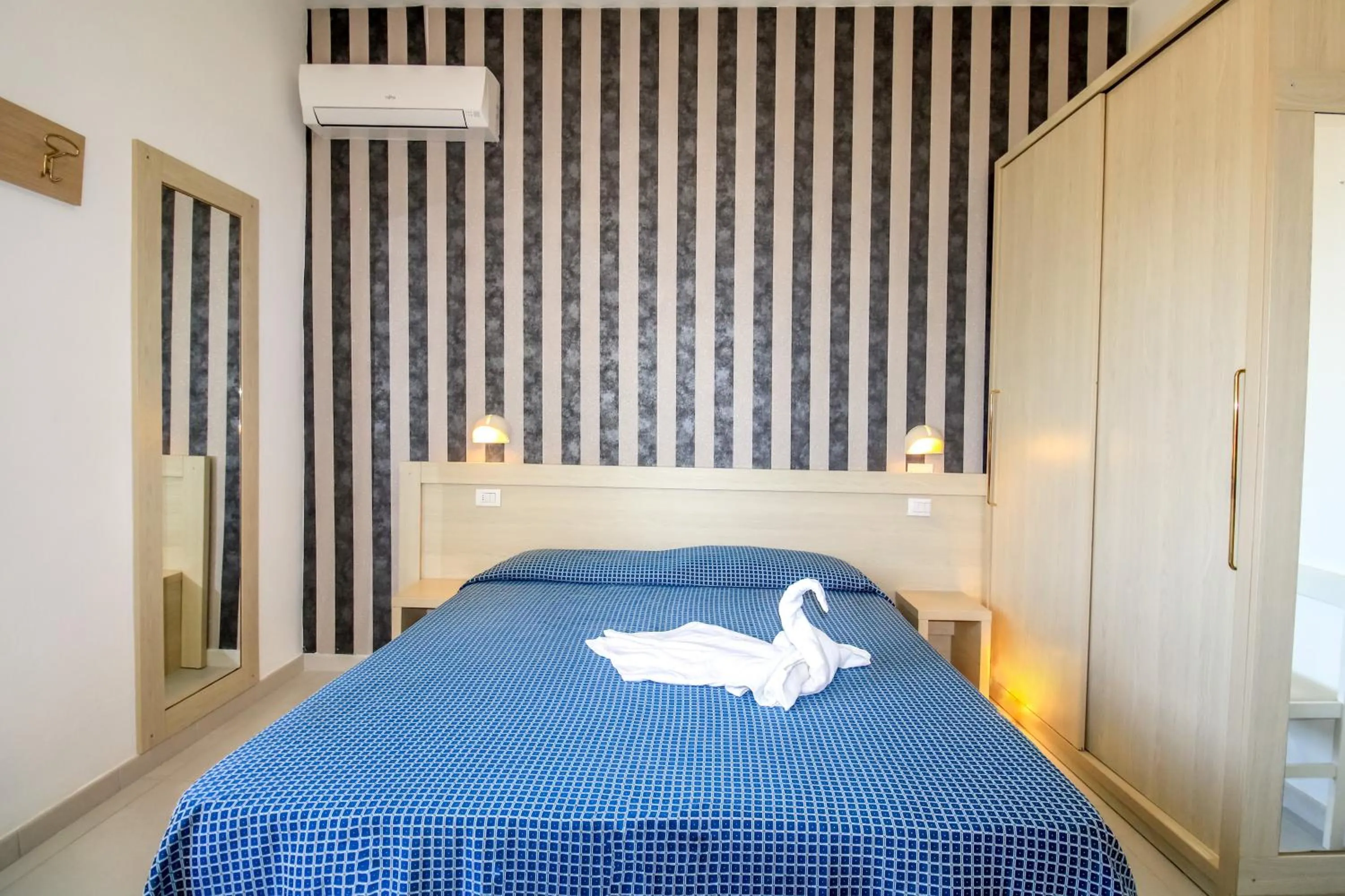 Bed in RESIDENZA ANNESSA Hotel Duca di Kent