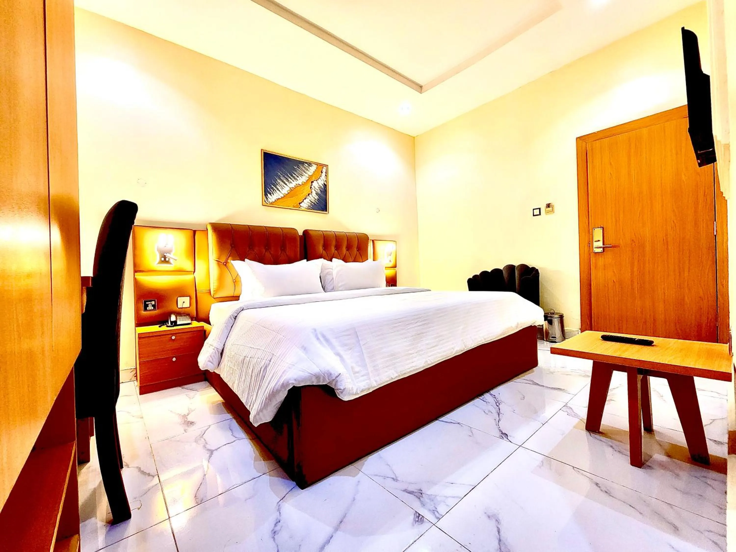 Bed in Buddiez Hotel & Resort