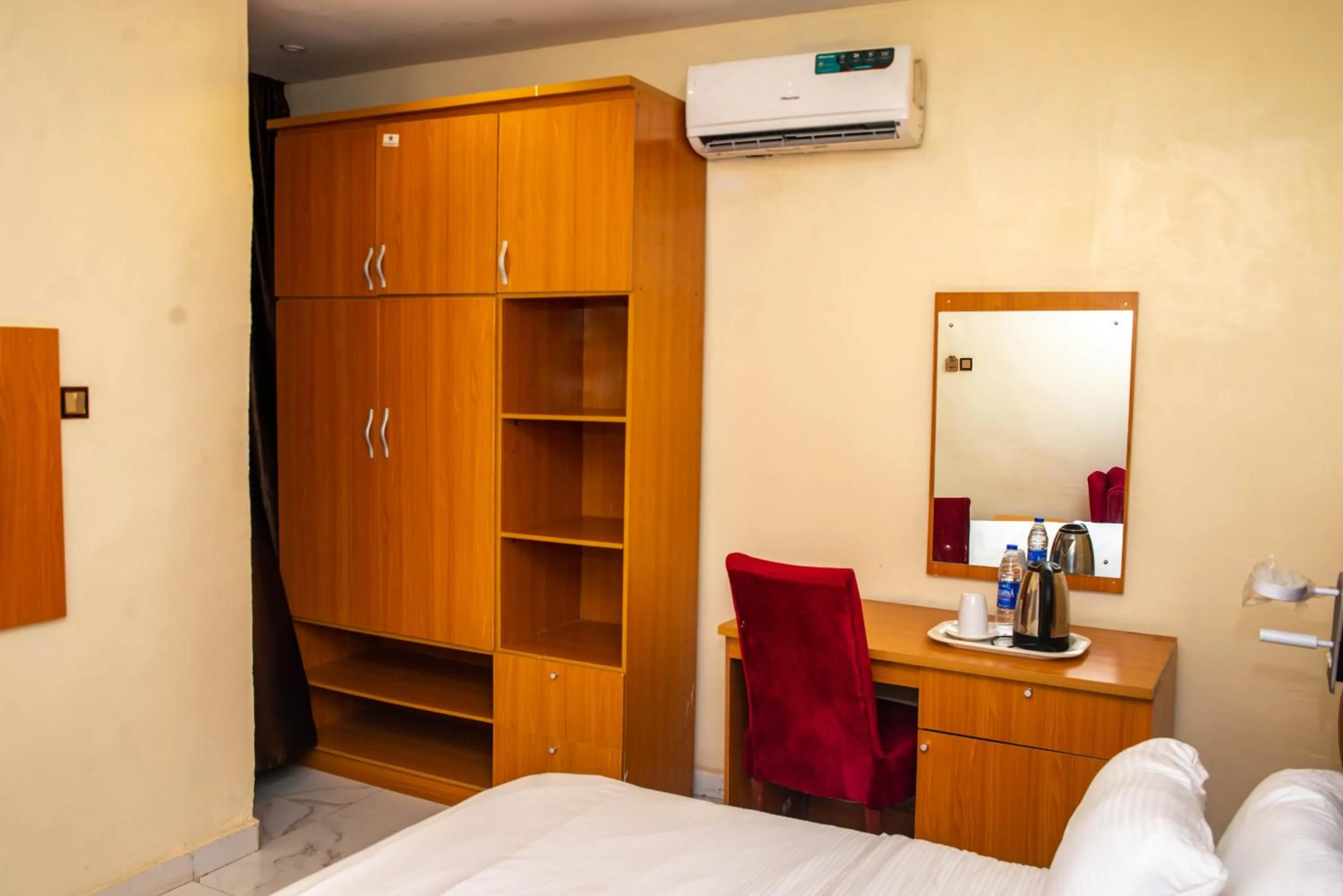 Bed in Buddiez Hotel & Resort