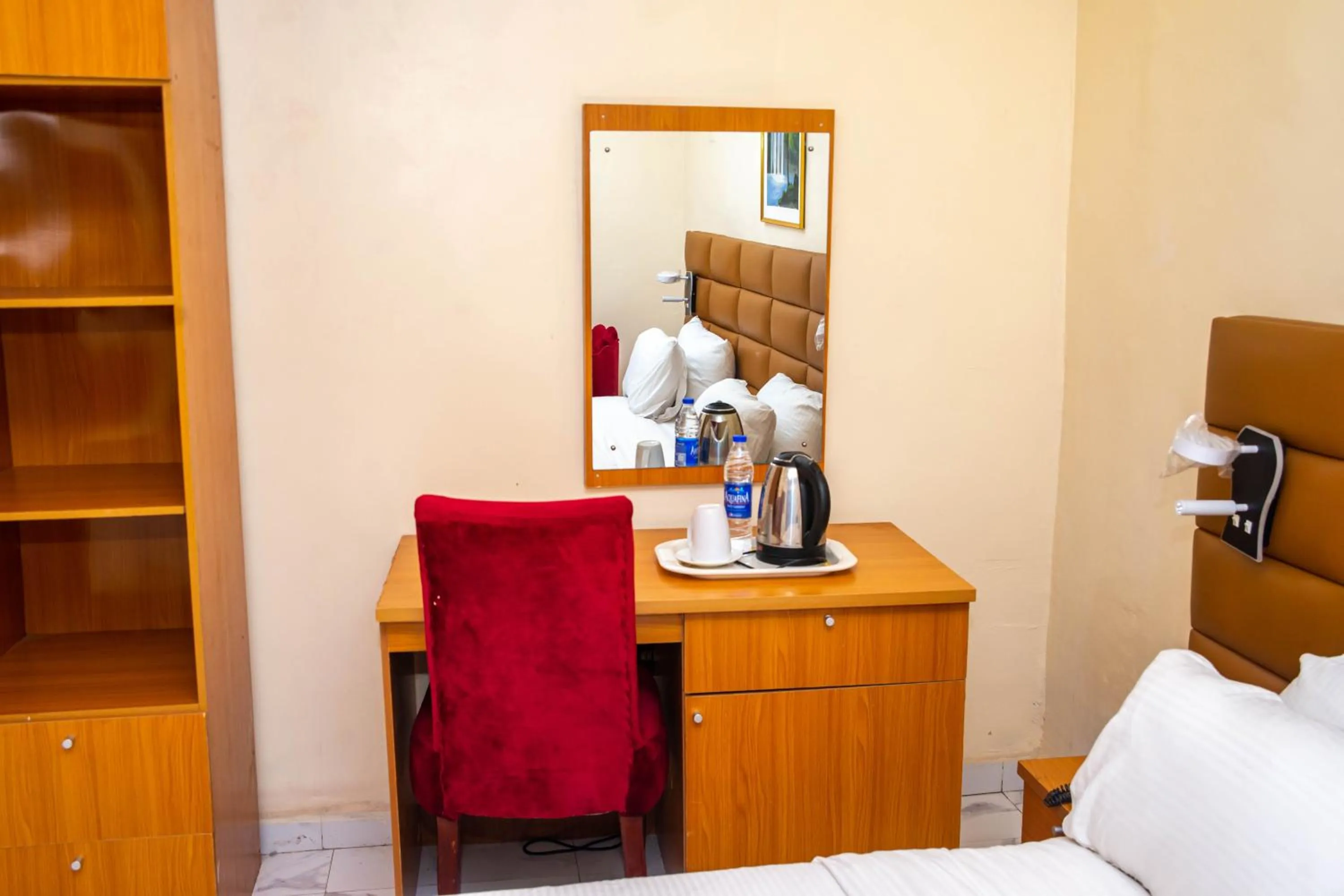 Bed in Buddiez Hotel & Resort