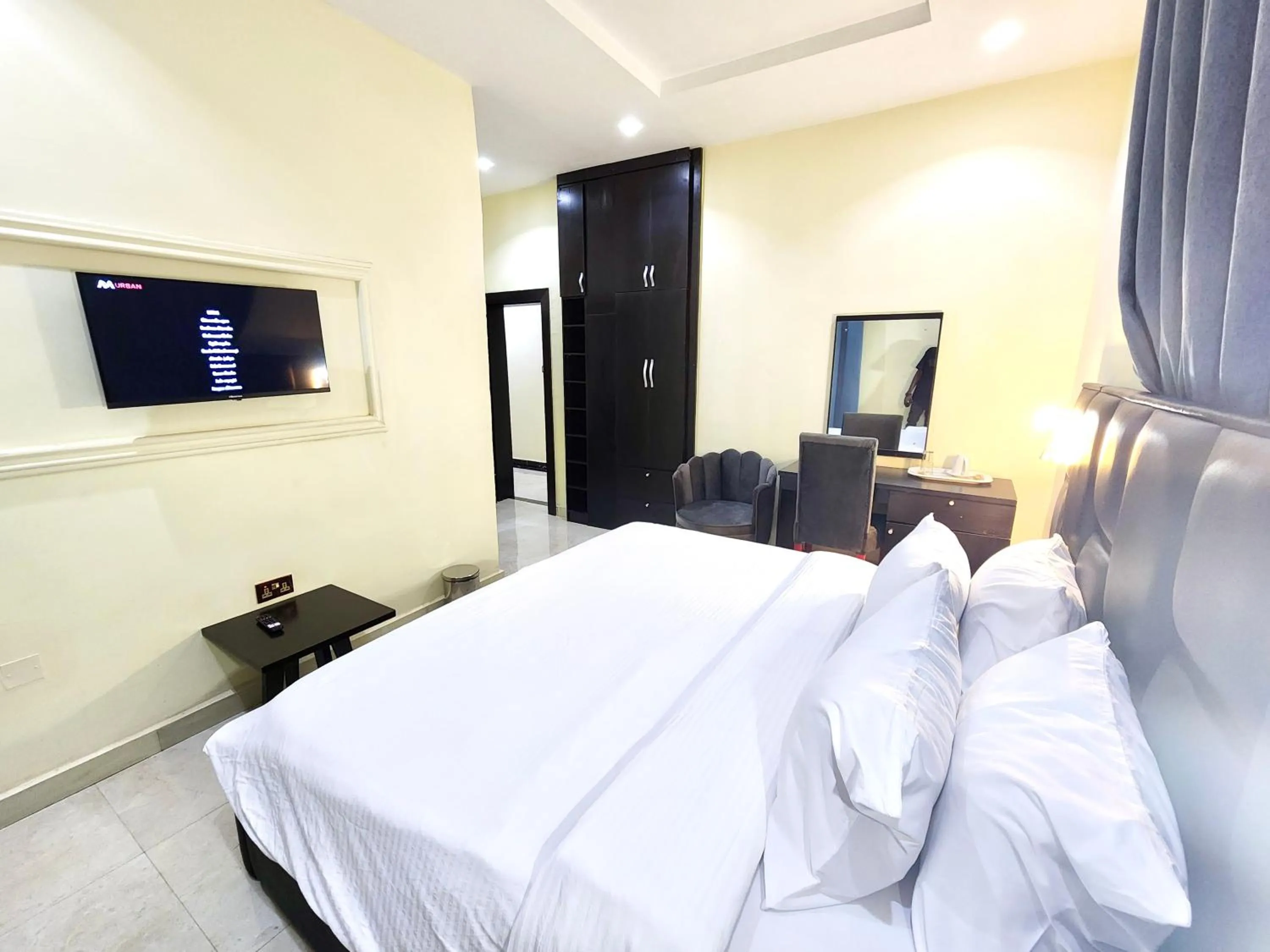 Bed in Buddiez Hotel & Resort