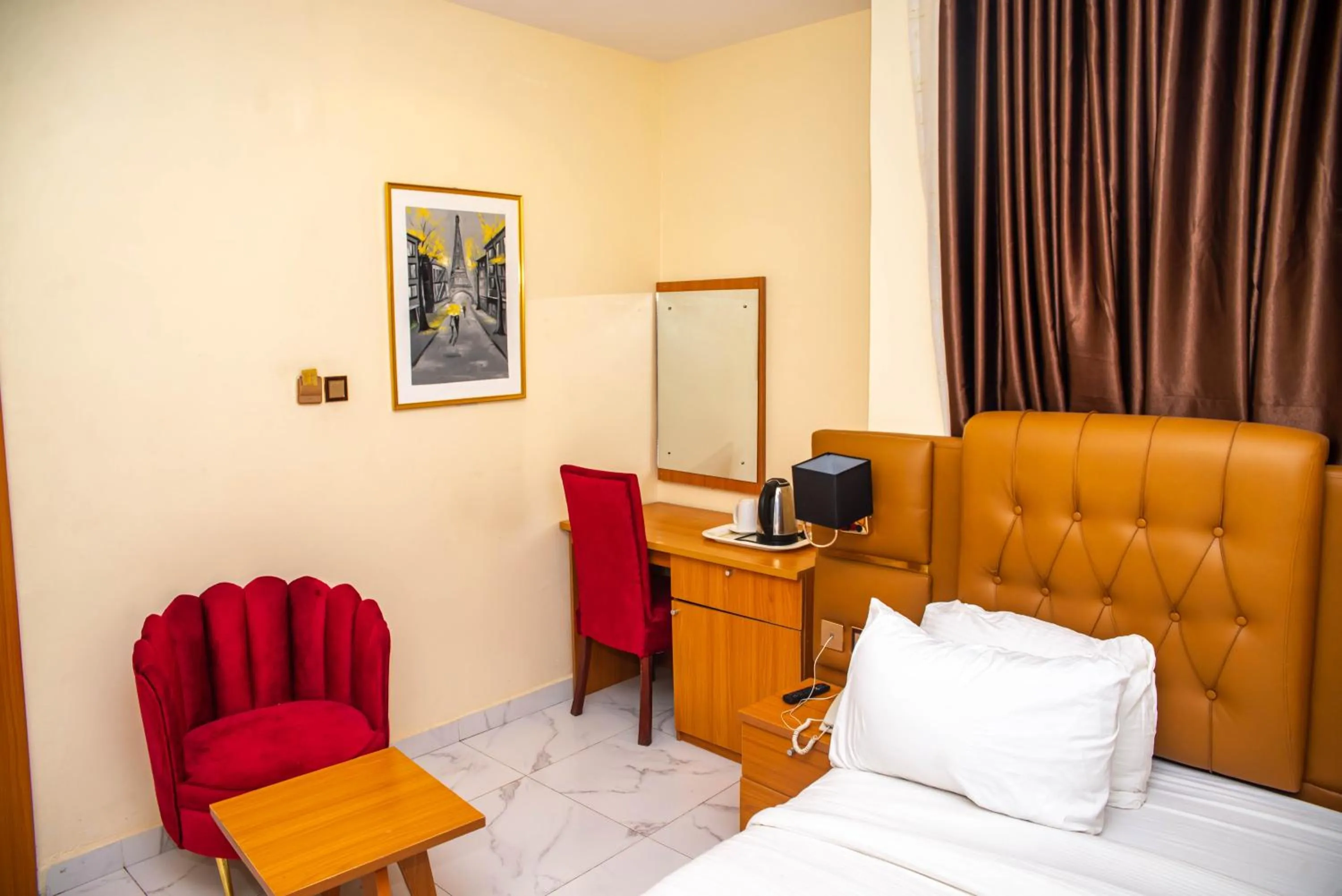 Bed in Buddiez Hotel & Resort