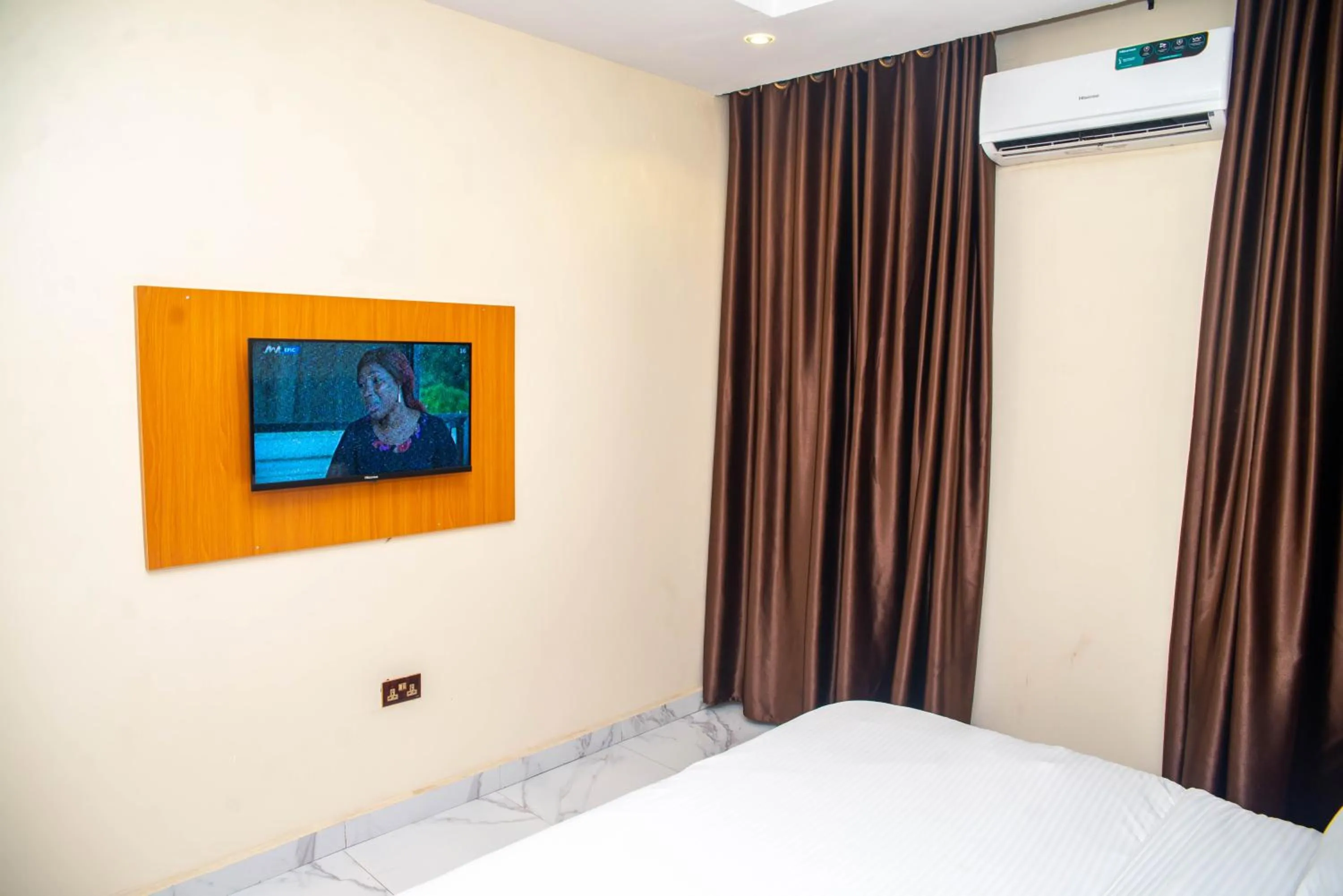 Bed in Buddiez Hotel & Resort