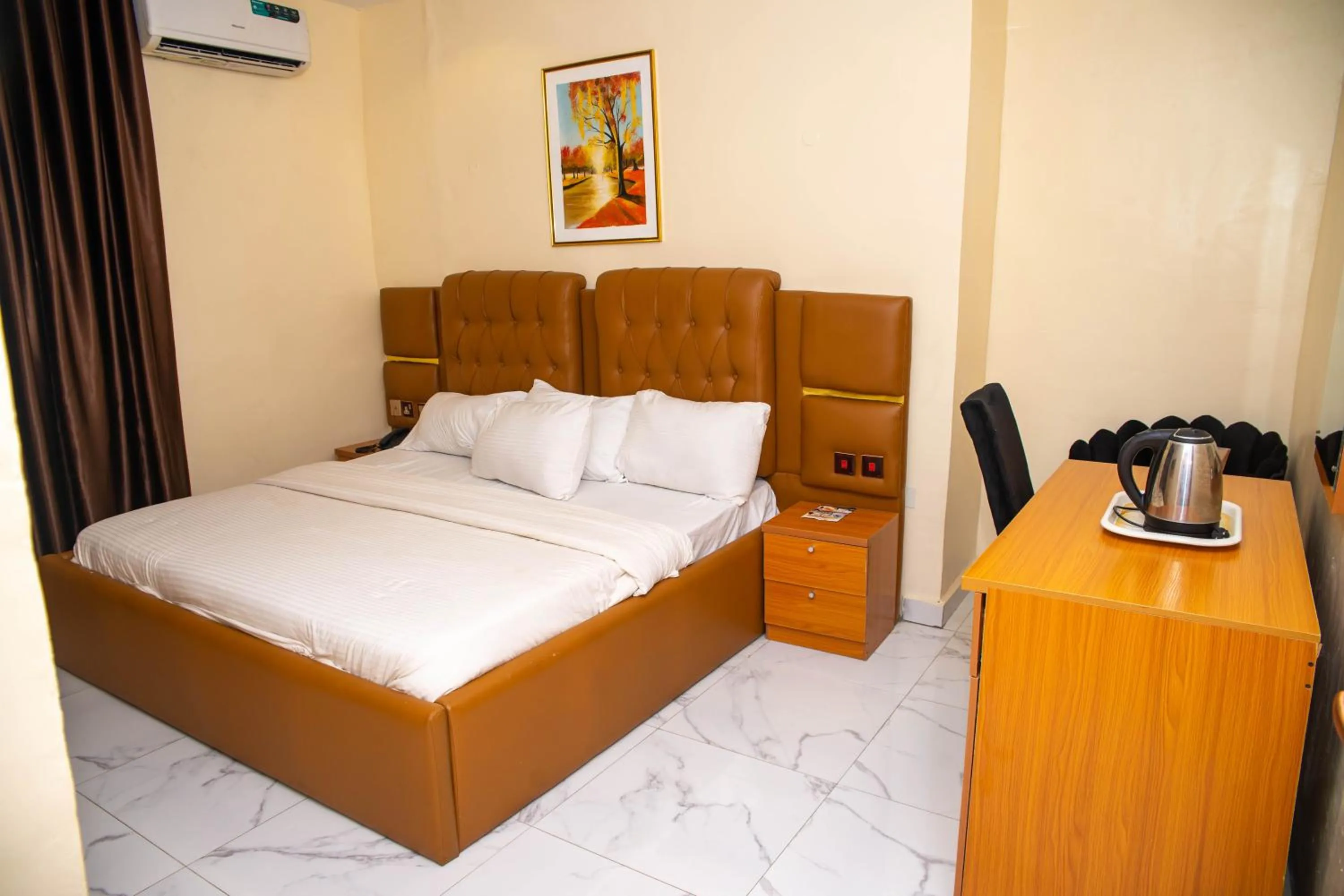 Bed in Buddiez Hotel & Resort